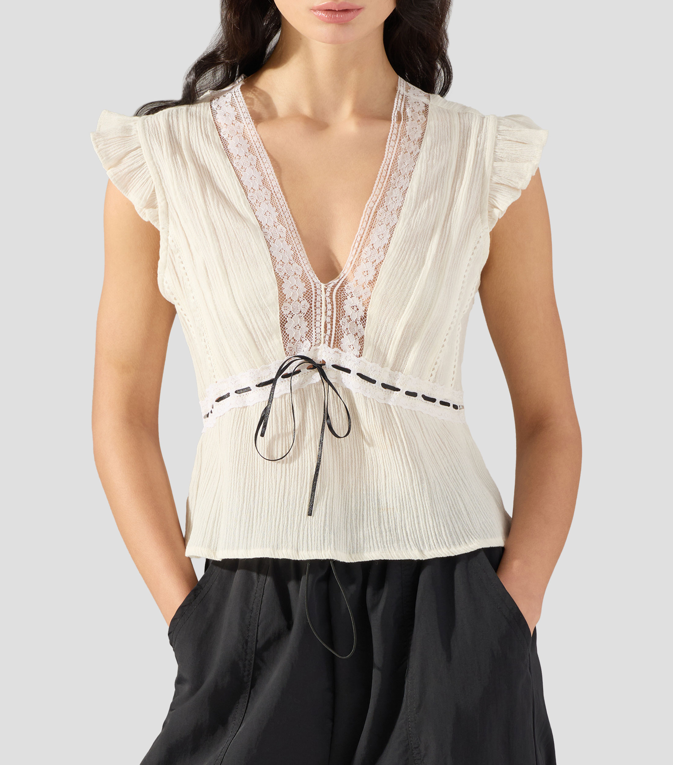 Blusa lisa sin mangas Mujer