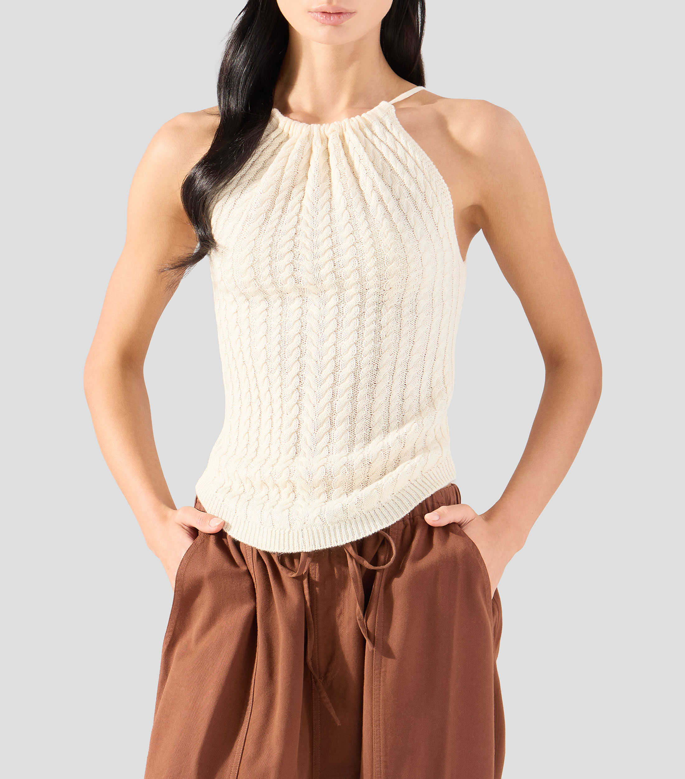 Blusa lisa sin mangas Mujer