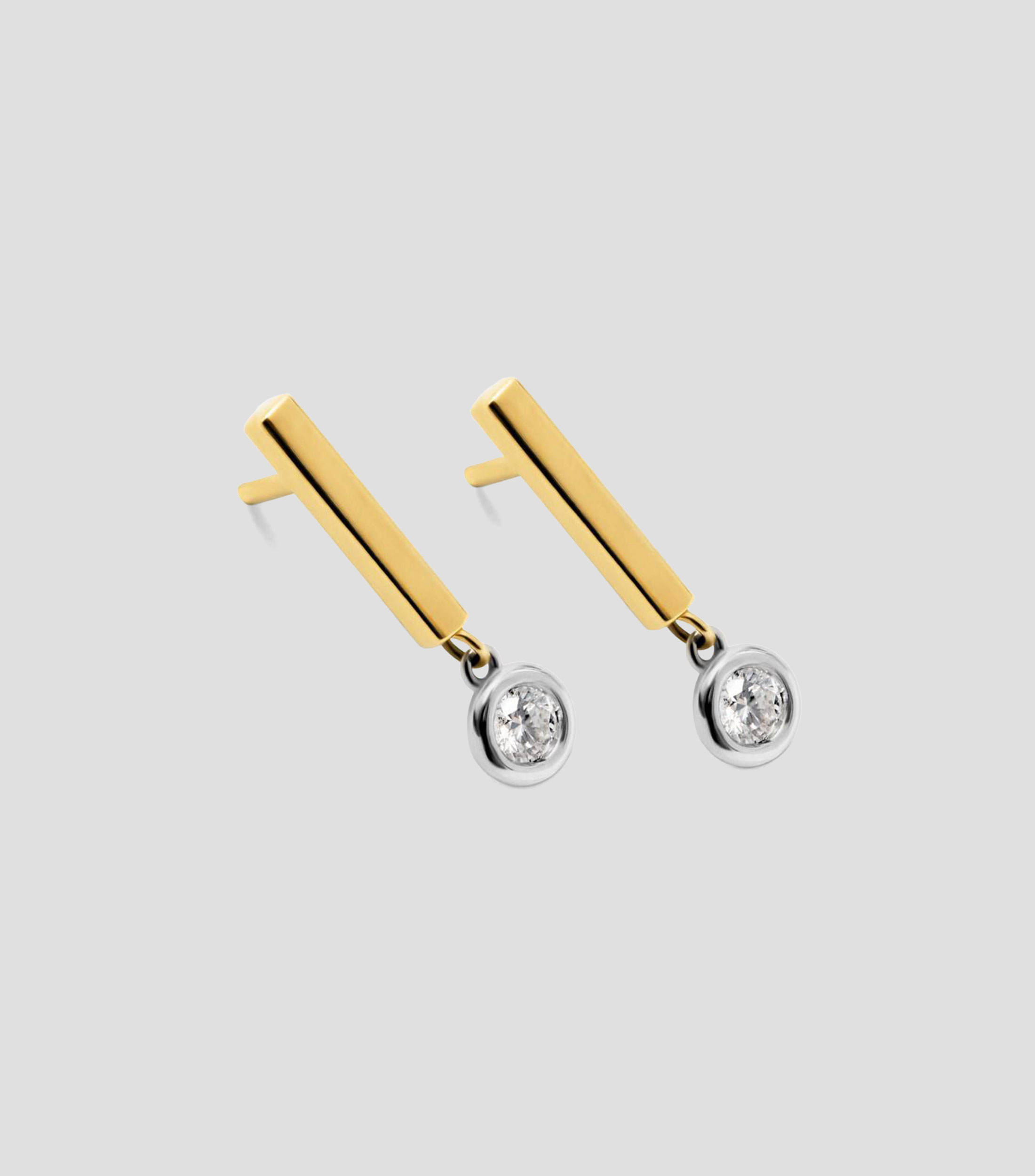 Aretes en Oro amarillo de 18 Kilates con 2 diamantes en talla brillante Mujer