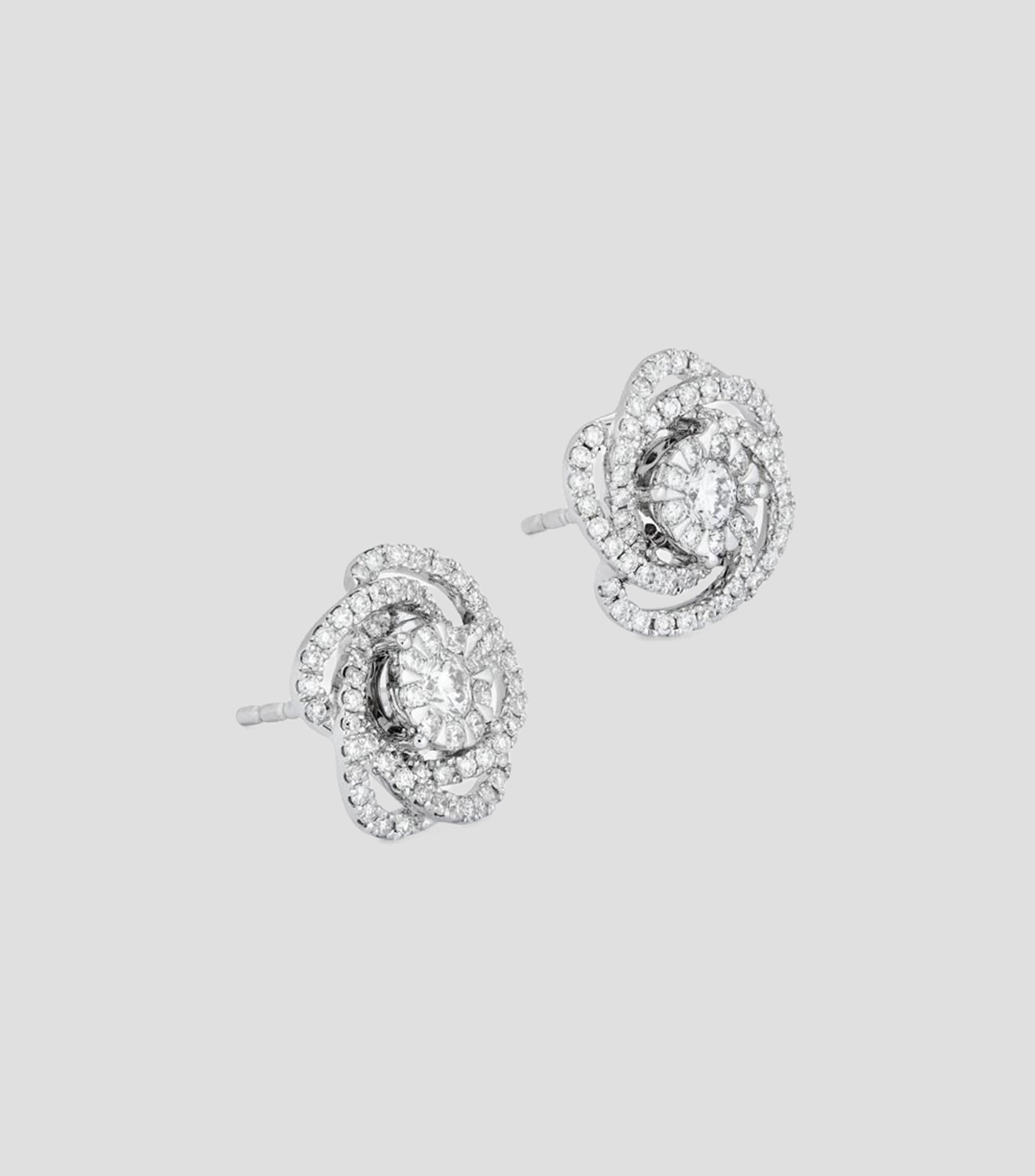 Aretes en Oro blanco de 18 Kilates con diamantes flor Mujer