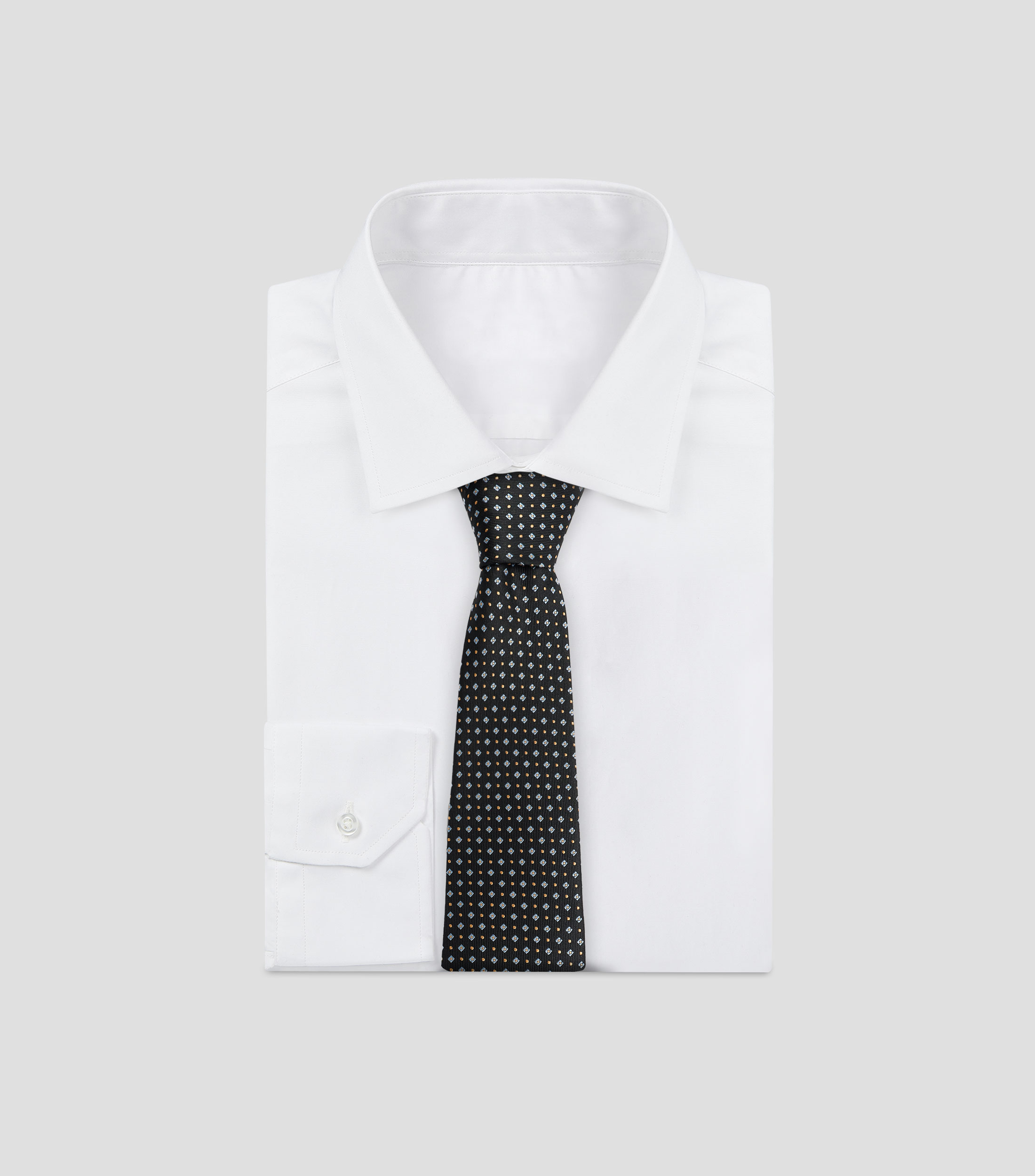 Corbata ancha con estampado de rombos y puntos