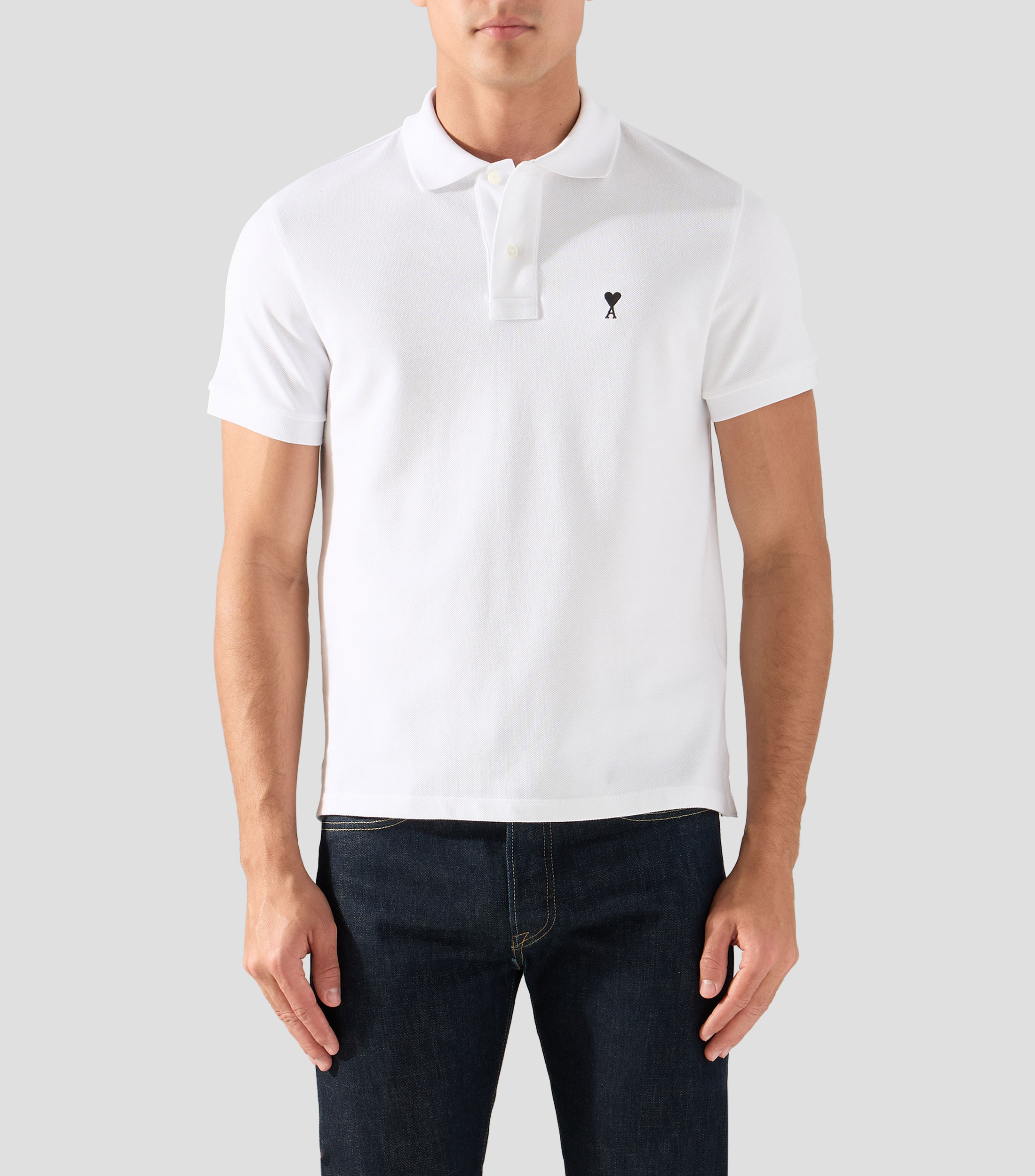 Playera tipo polo con manga corta lisa Hombre