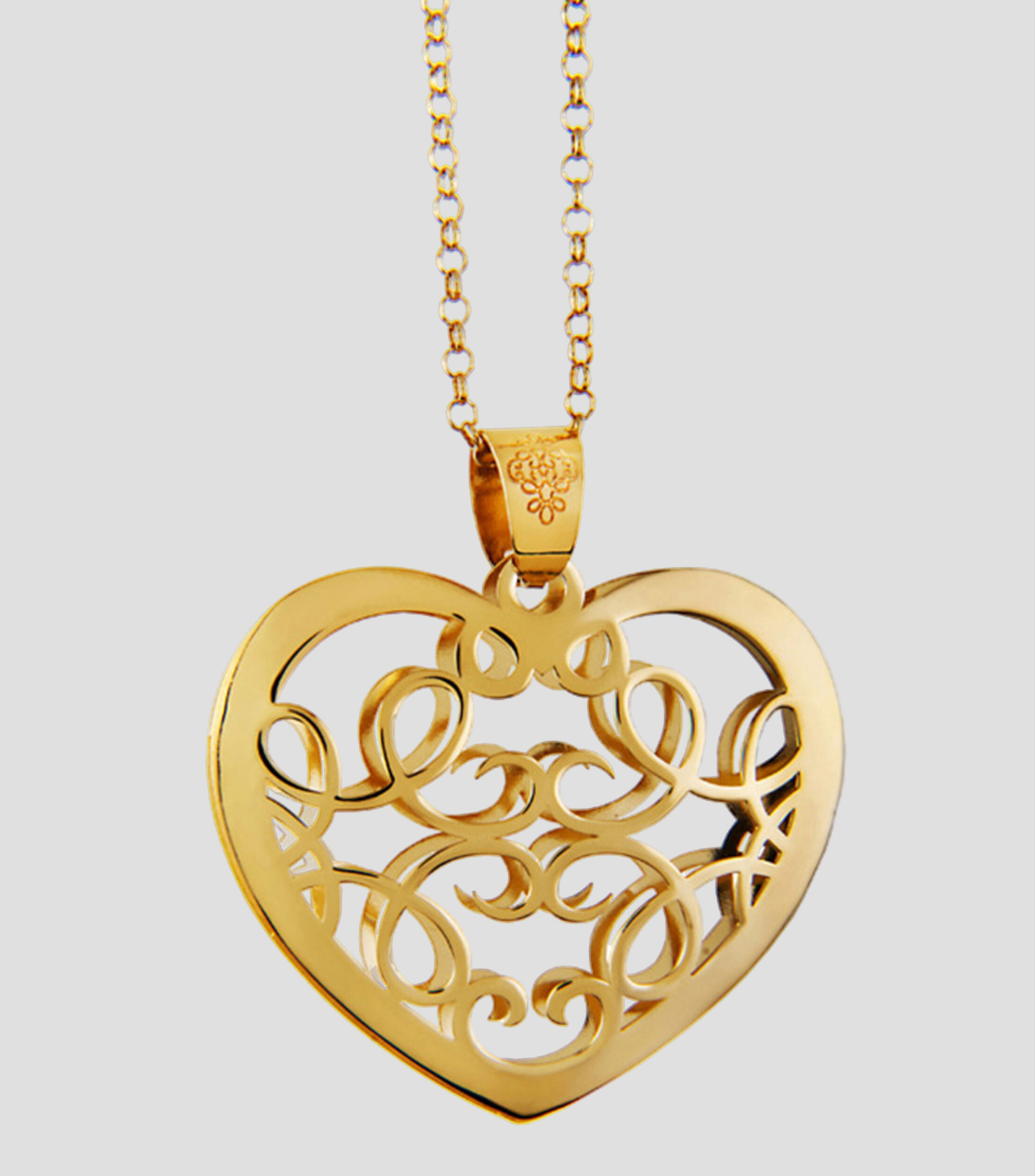 Dije corazón en plata Mujer