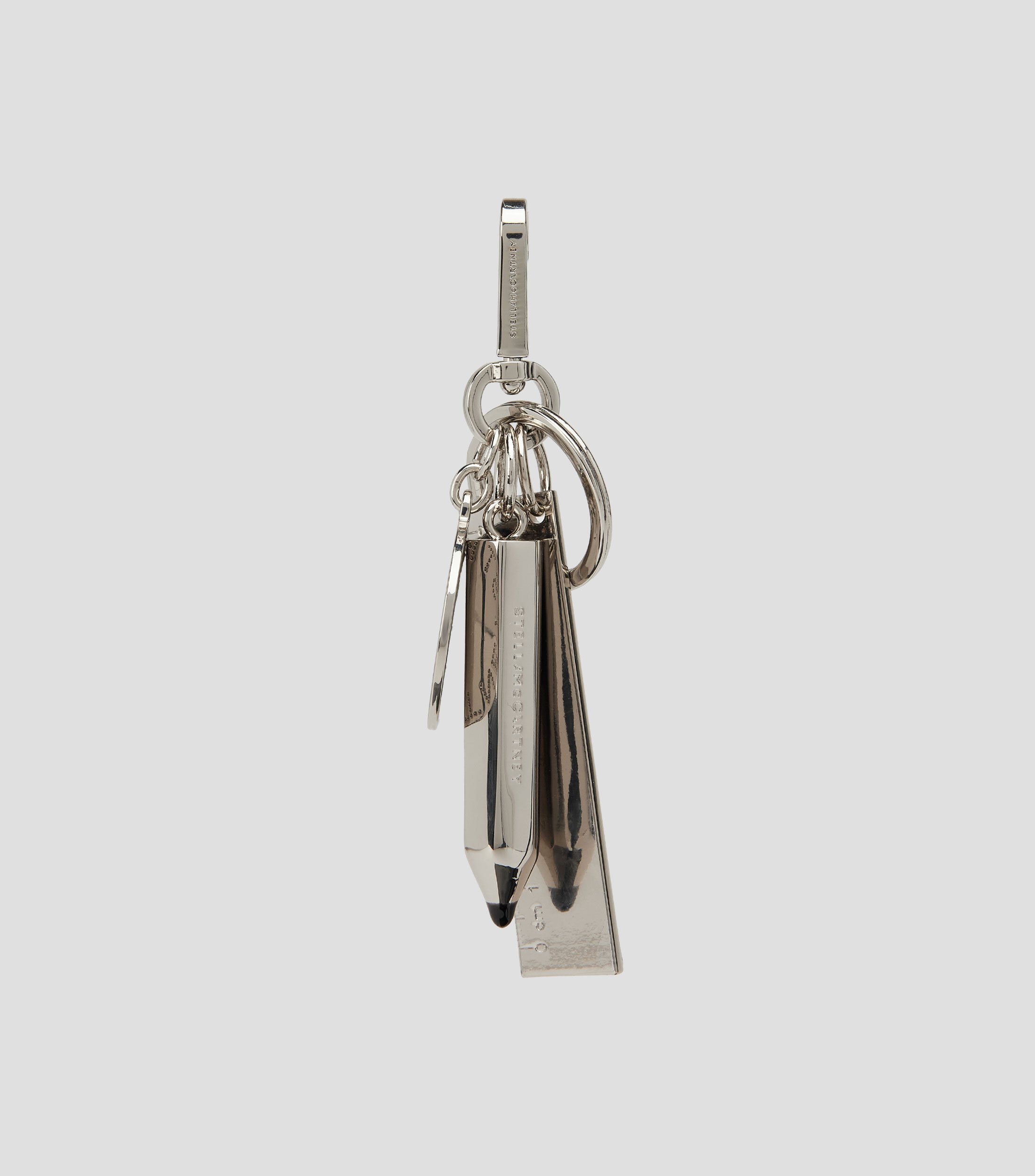 Charm de lápiz con regla Mujer