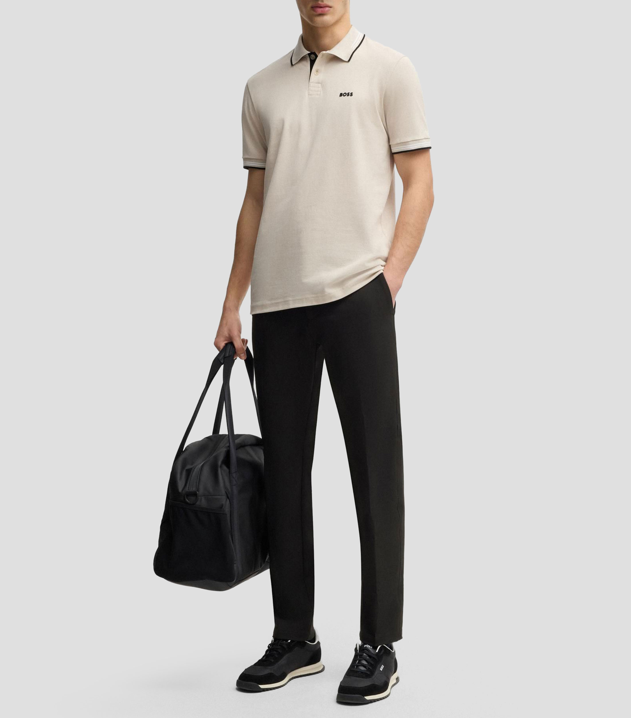 Pantalón slim fit de tejido elástico repelente al agua Hombre