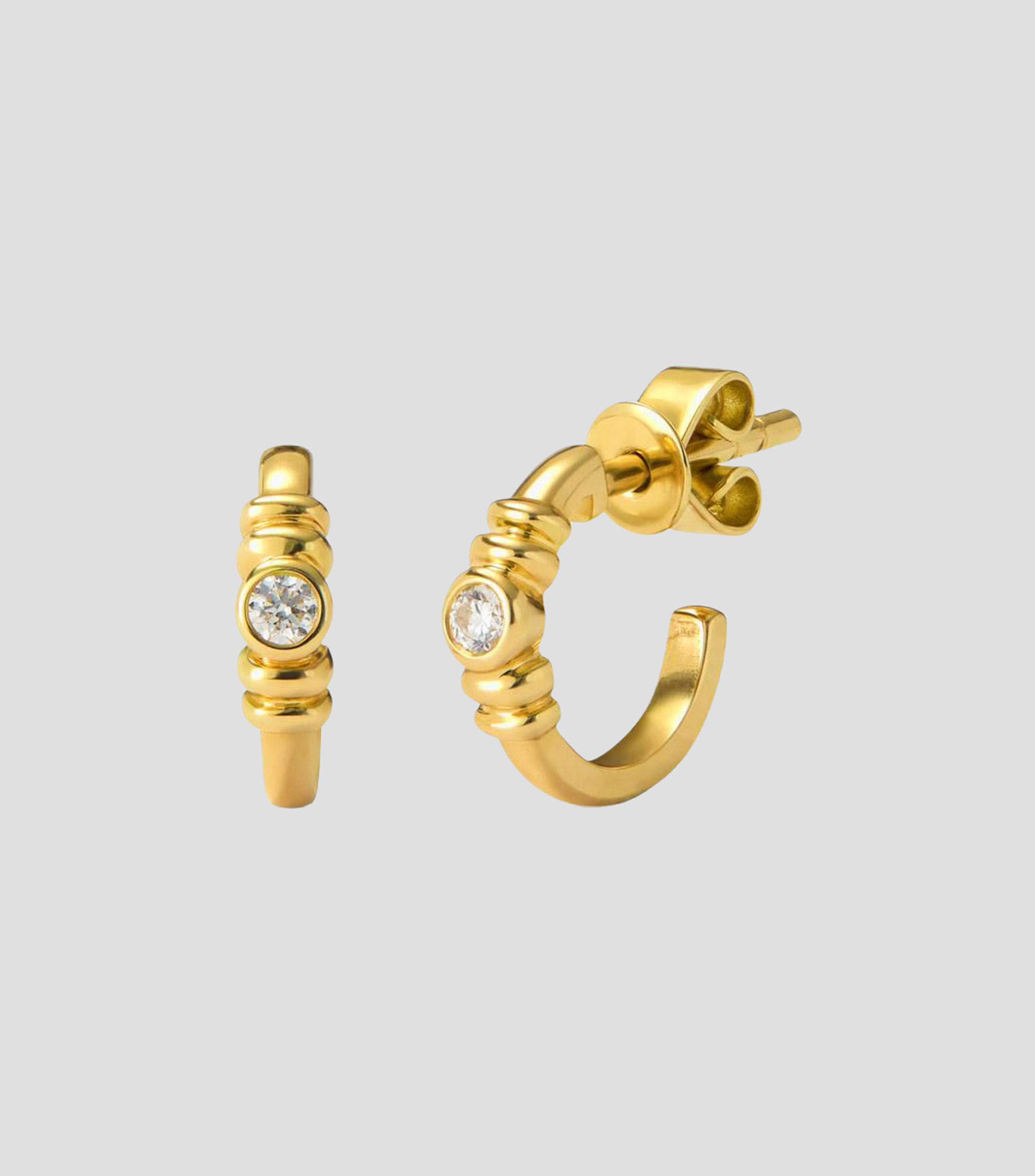 Aretes de aro en Oro amarillo de 18 Kilates con diamantes en talla brillante Mujer