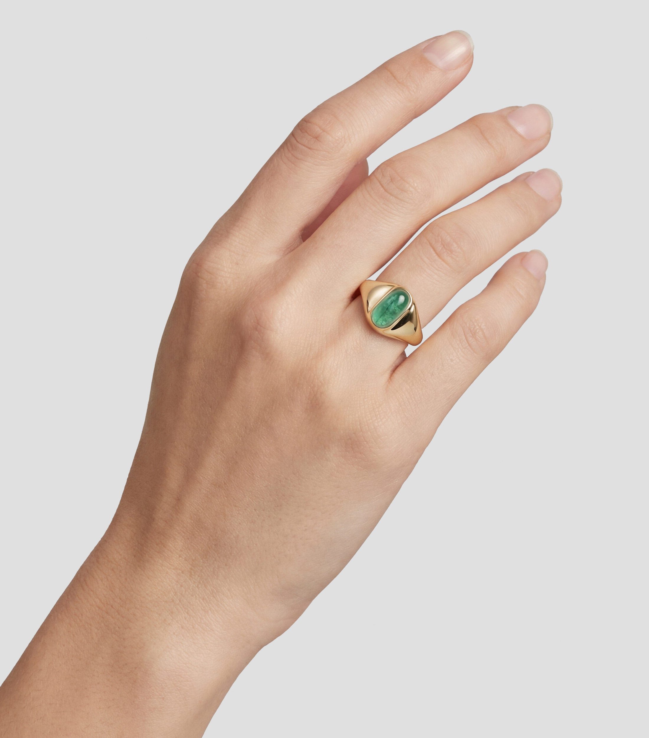 Anillo en oro amarillo de 18 kilates con esmeralda Mujer