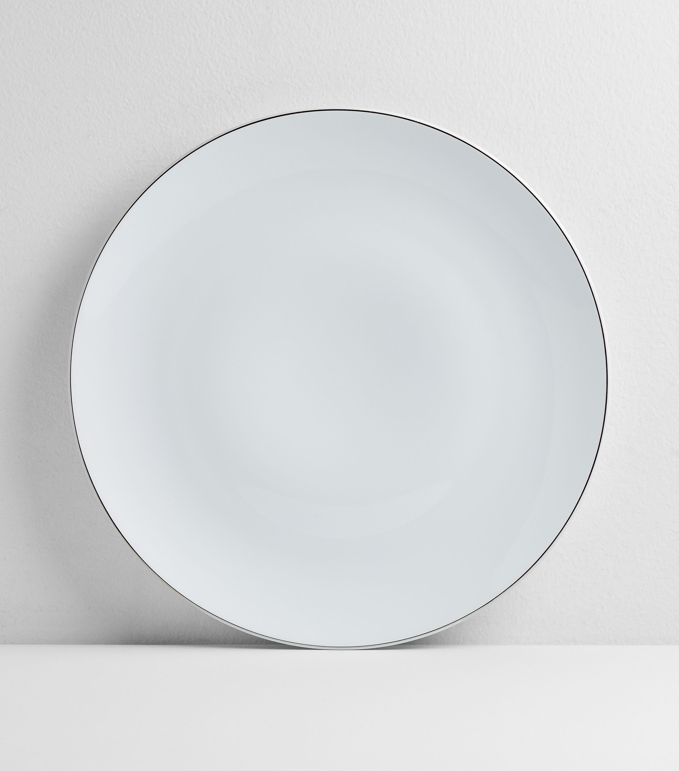 Plato base Bright en porcelana blanca