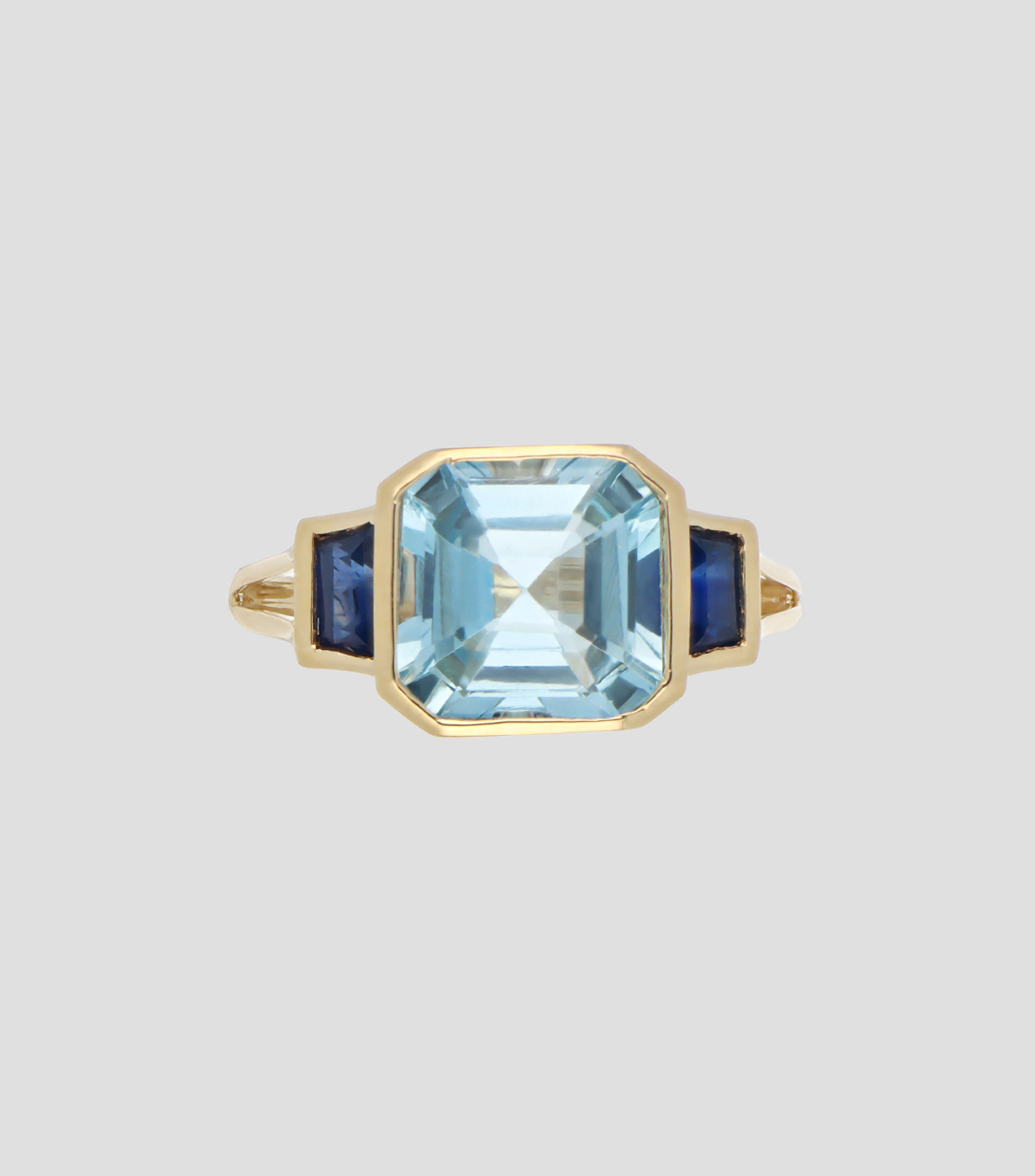 Anillo en oro amarillo 18 kilates con zafiro y topacio Mujer