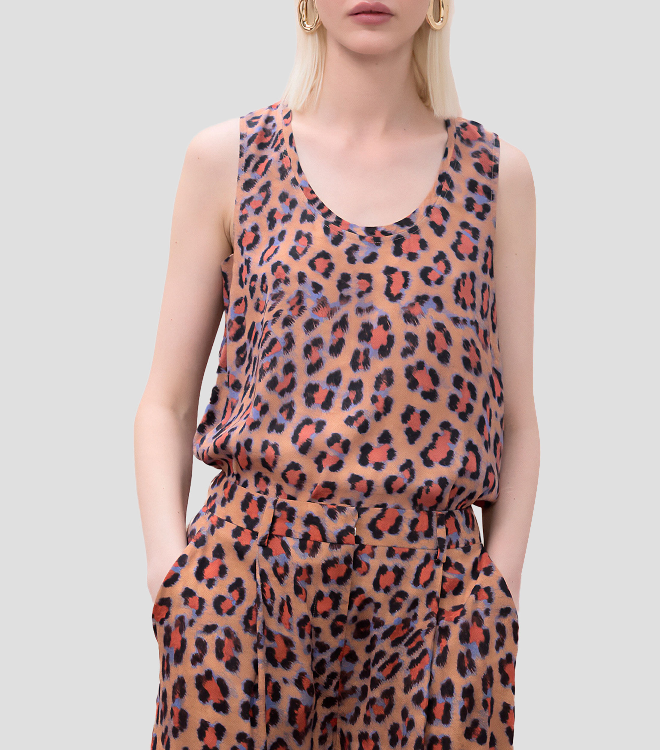 Blusa animalprint sin mangas Mujer