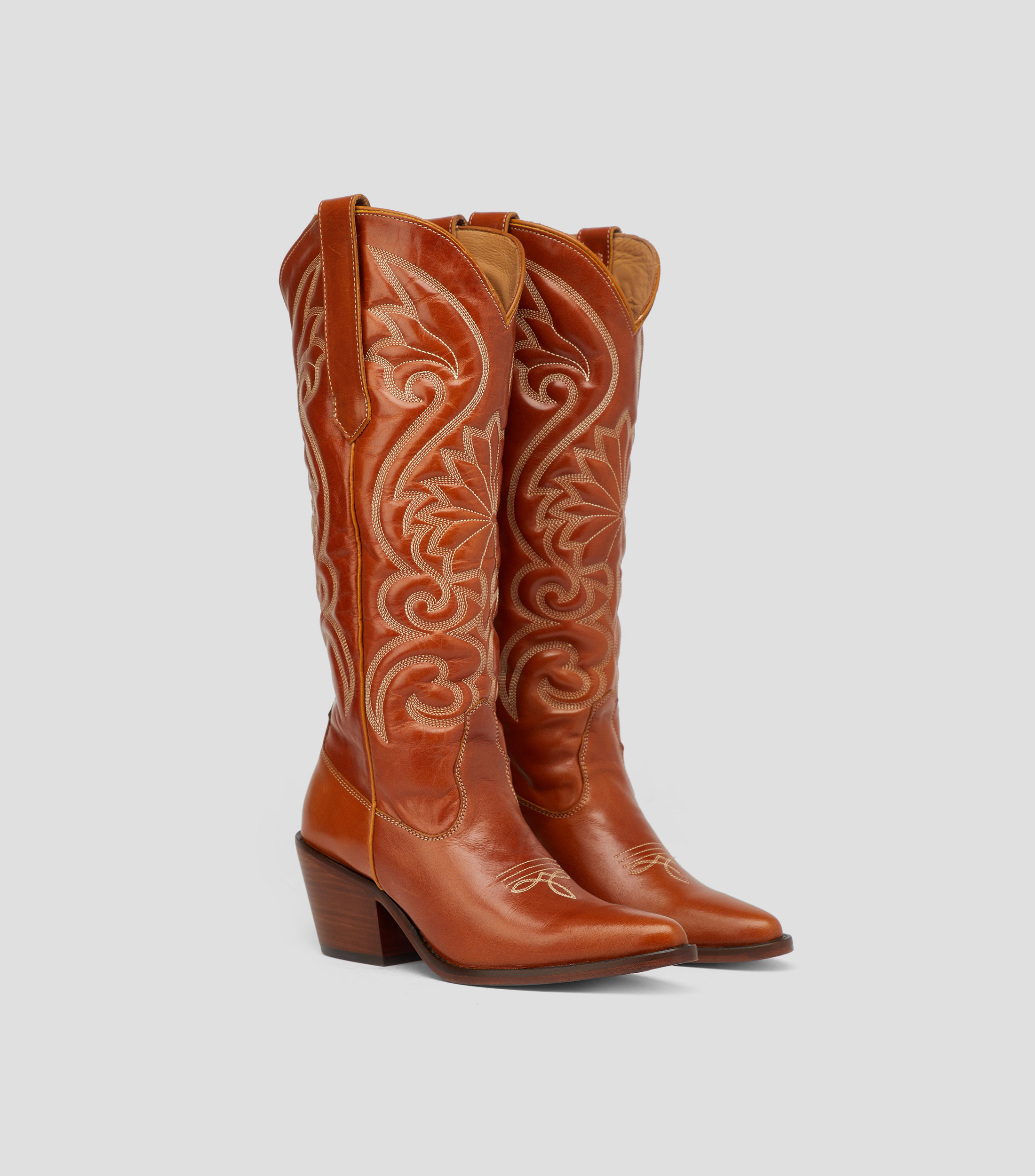 Botas vaqueras altas en piel con tacón medio ancho Mujer
