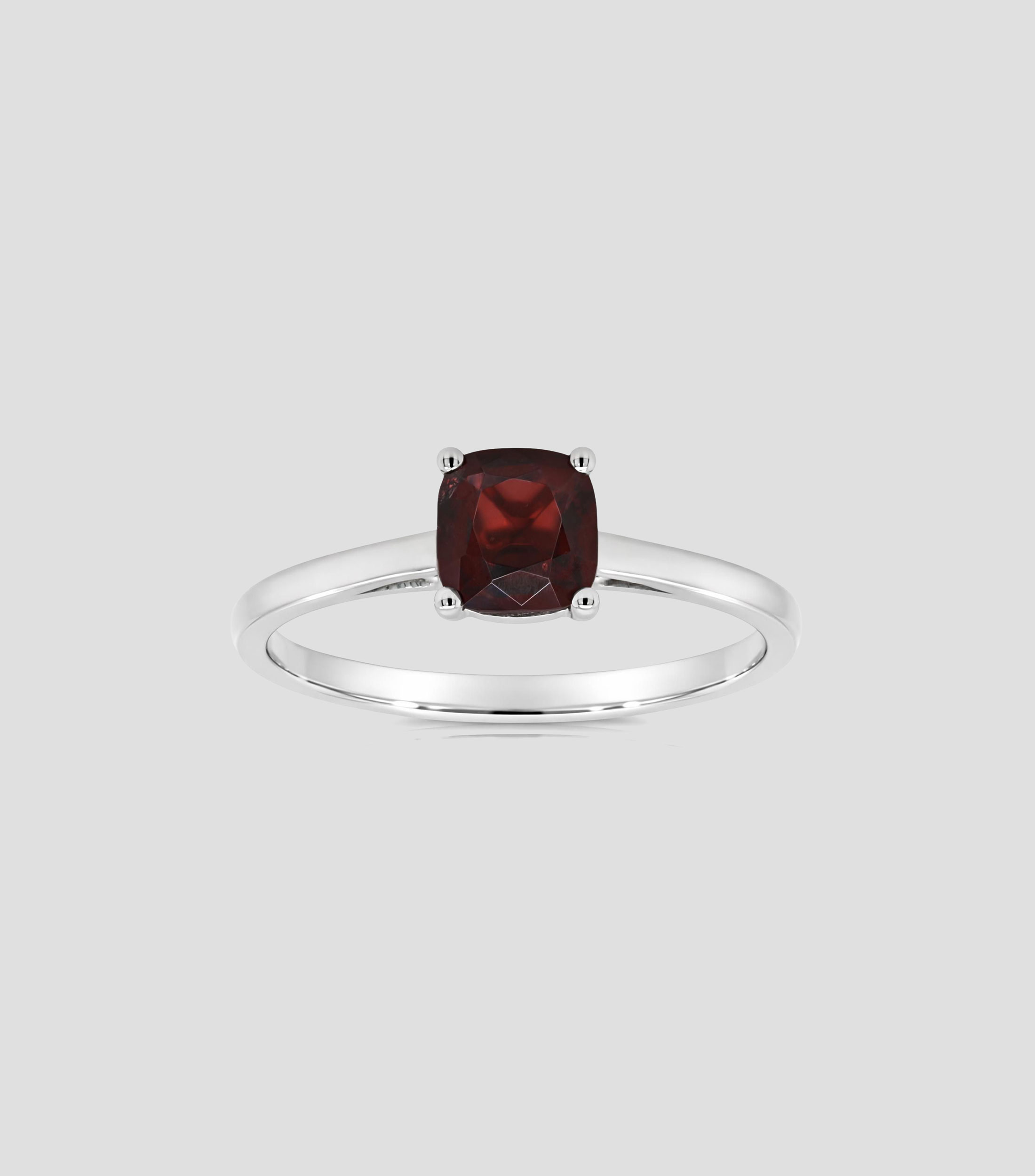 Anillo en Oro blanco de 14 Kilates con granate Mujer