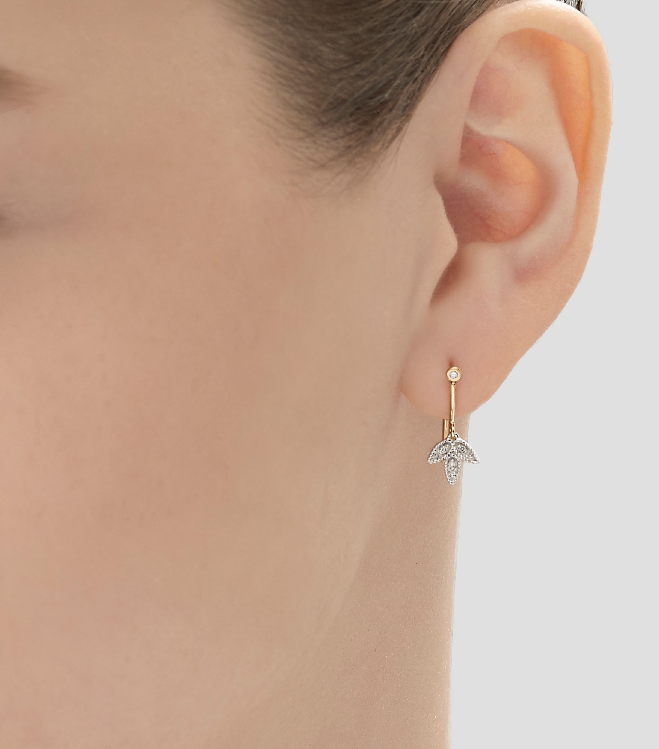 Arete en oro amarillo 18 Kilates Mujer