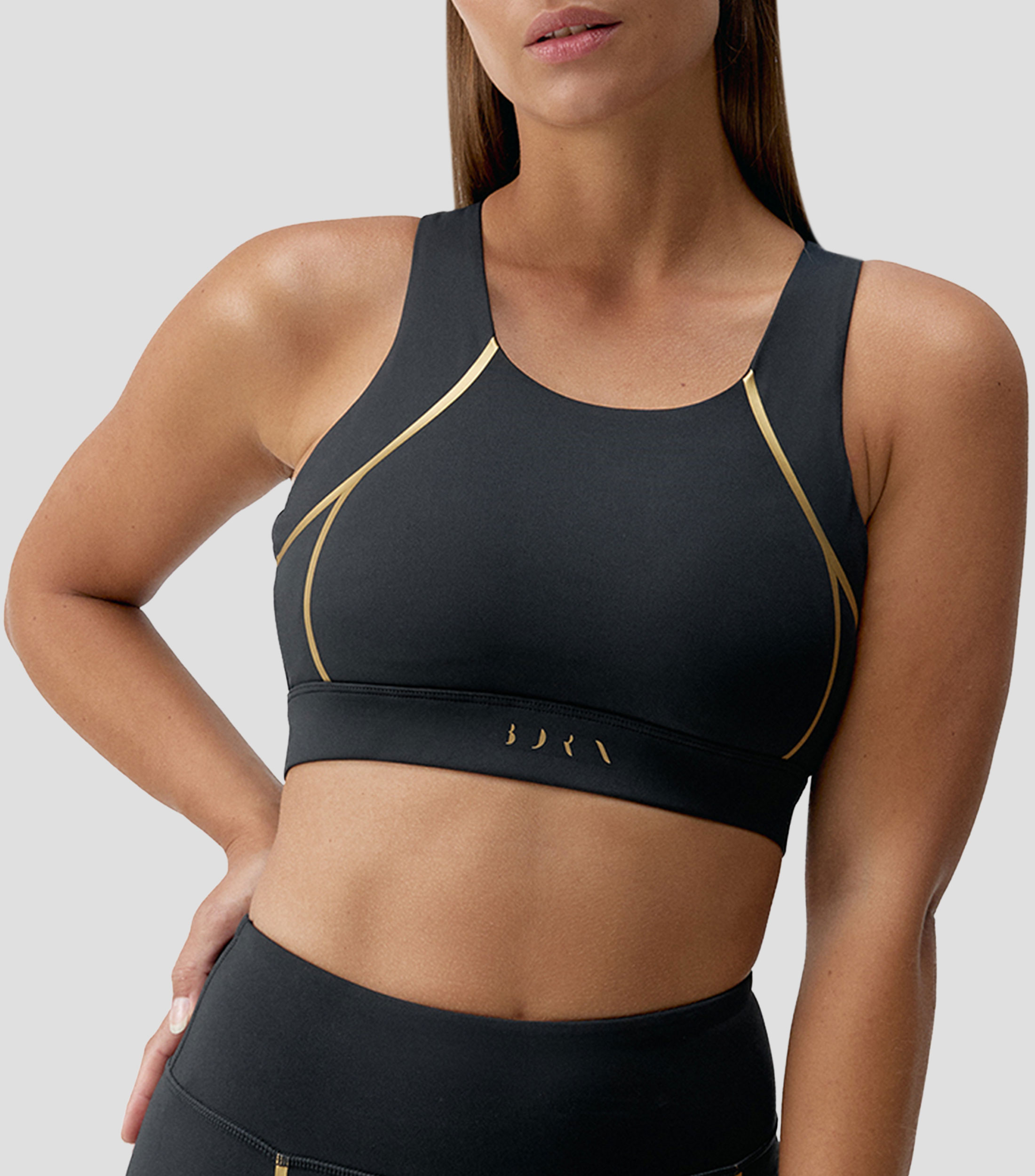 Top deportivo Gold Mujer