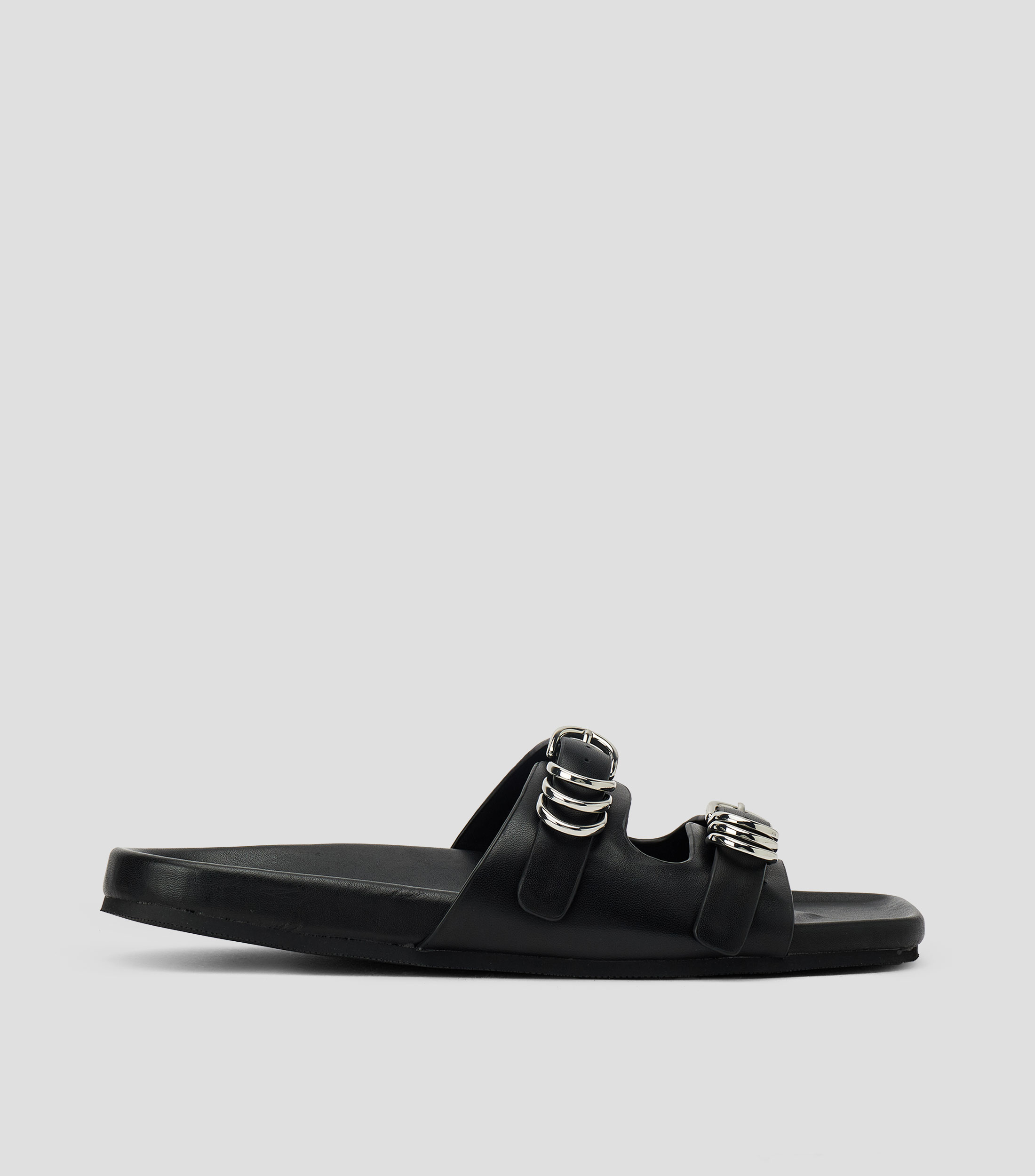 Sandalias planas en piel Mujer