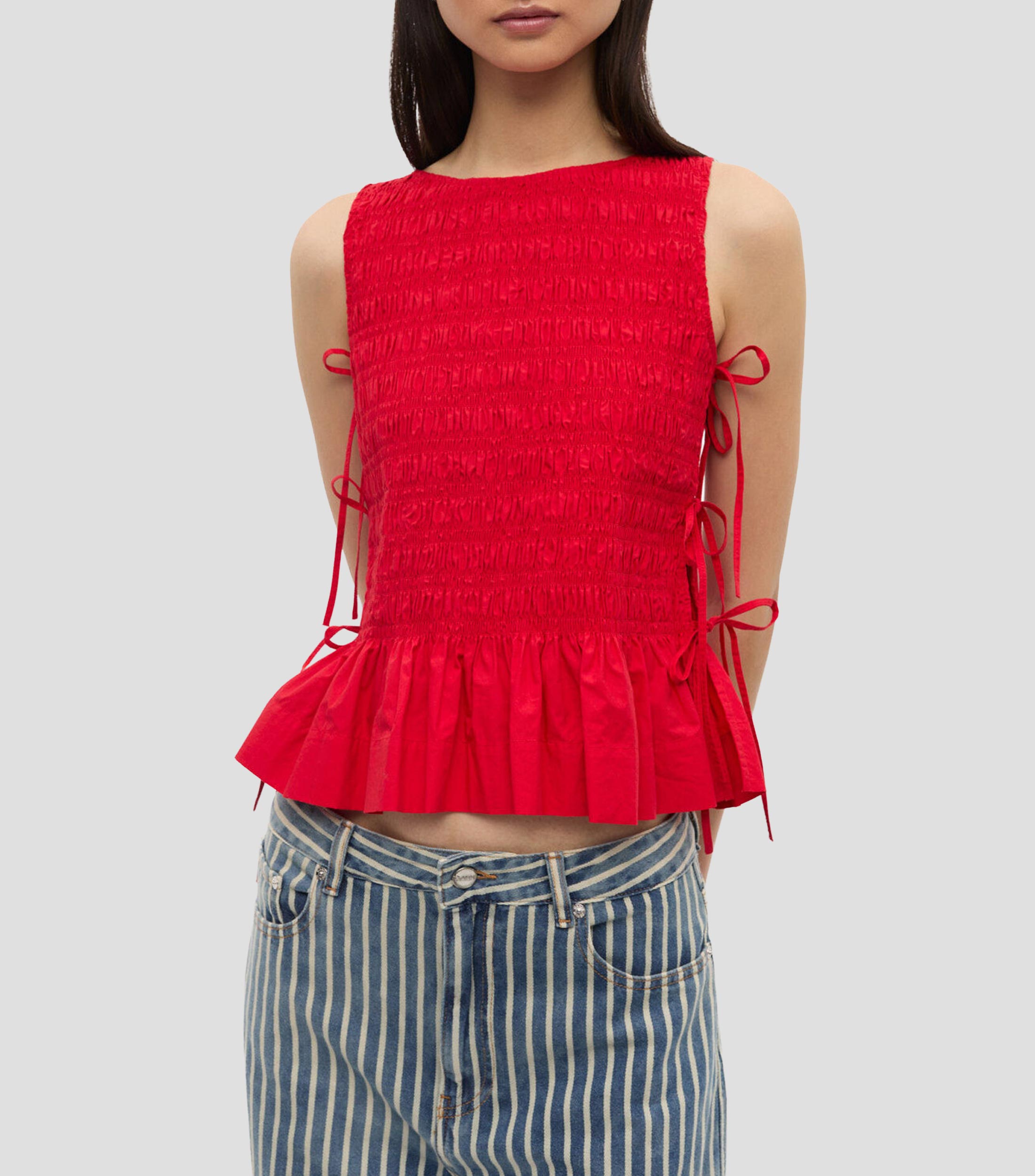 Blusa lisa sin mangas Mujer