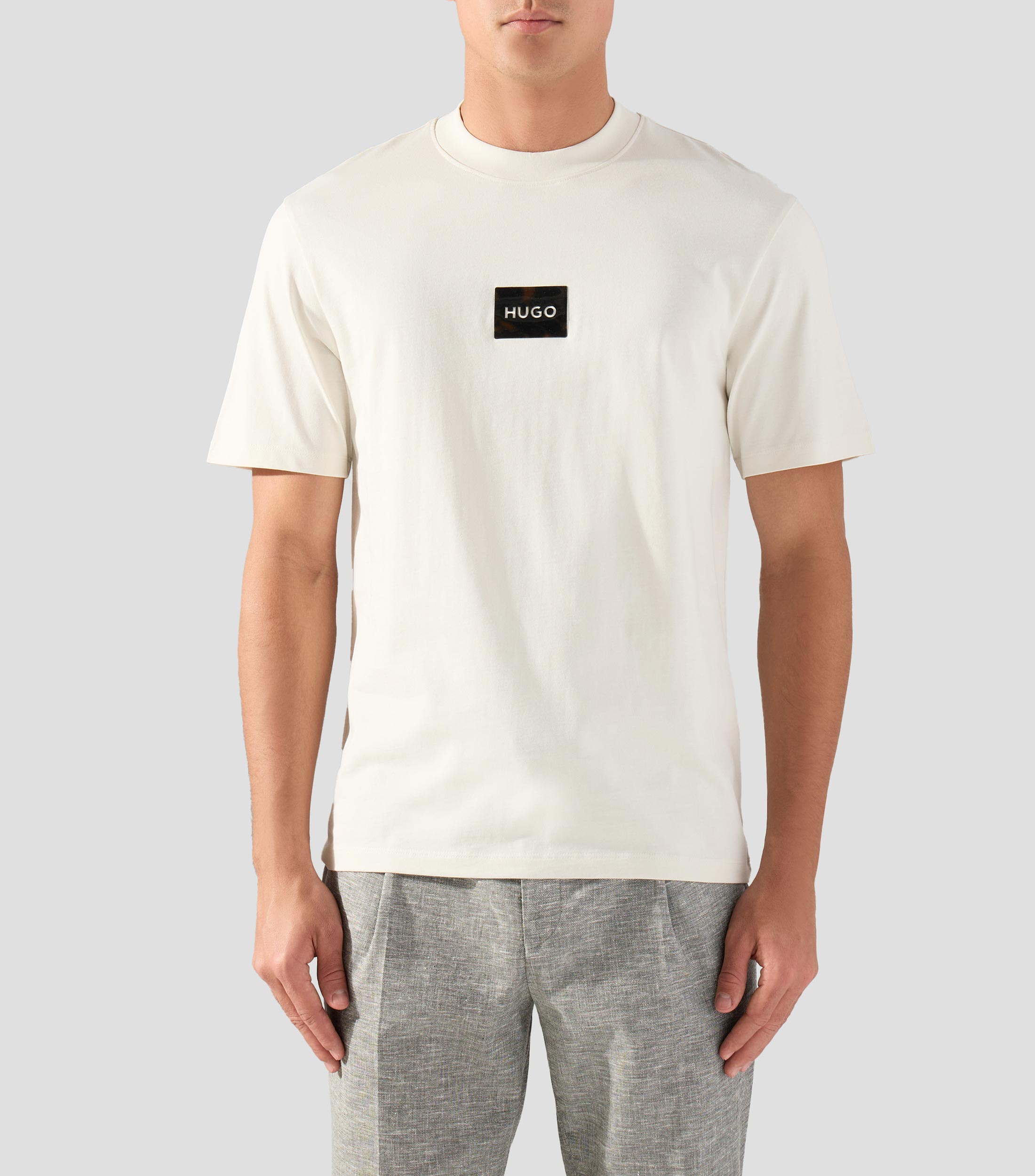 Playera de punto de algodón con parche de logo de carey Hombre
