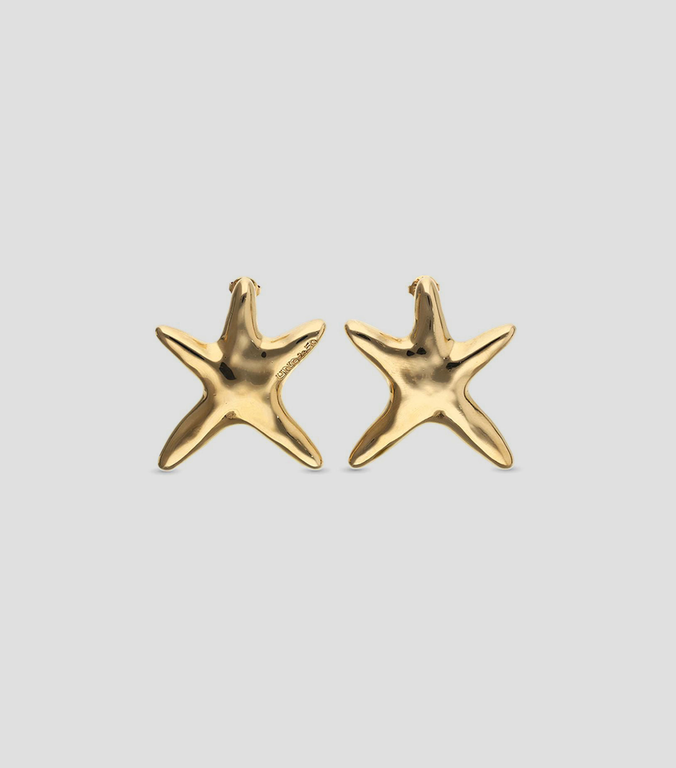 Aretes estrella Arcadia Mujer