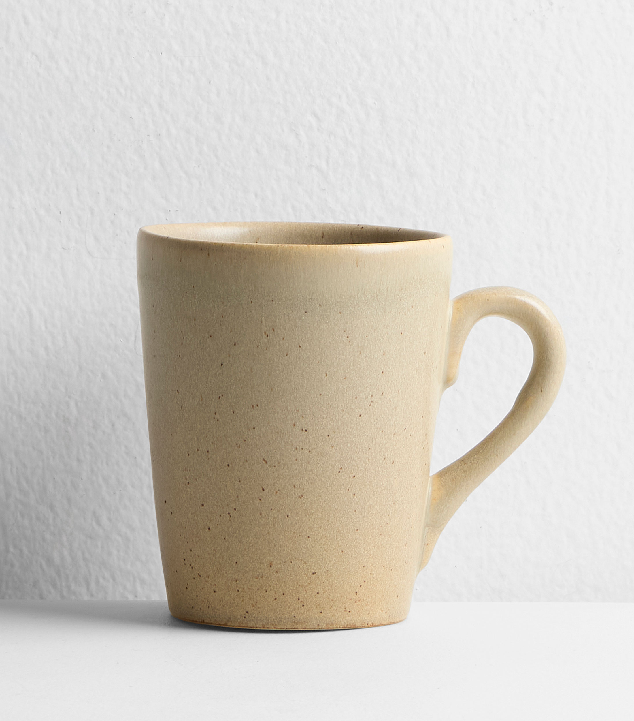 Taza beige en cerámica