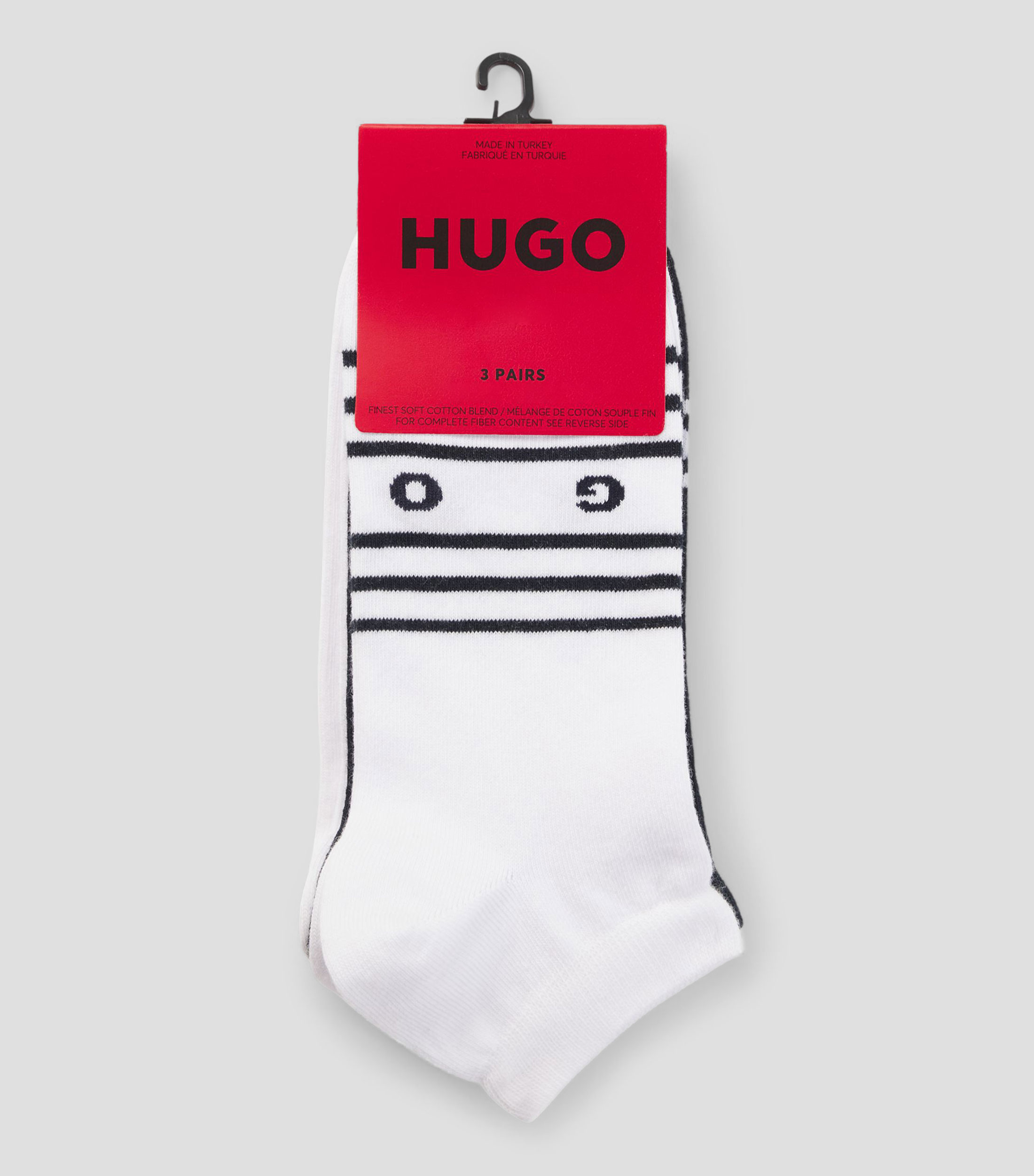 Paquete de tres pares de calcetines deportivos con detalles de rayas Hombre