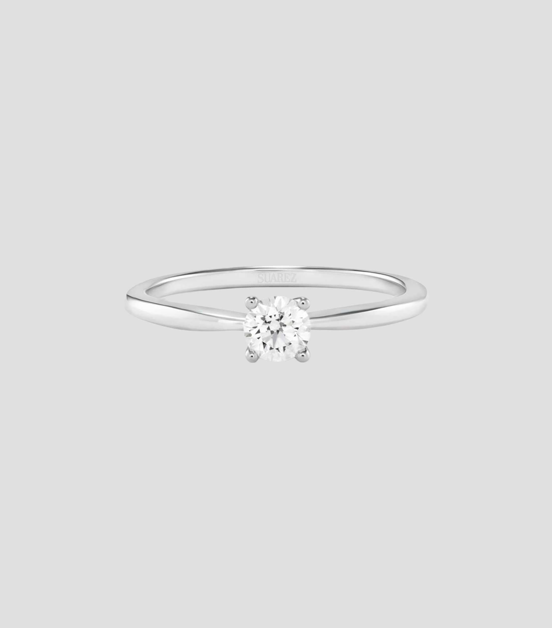 Anillo solitario en Oro blanco de 18 Kilates con diamante Mujer