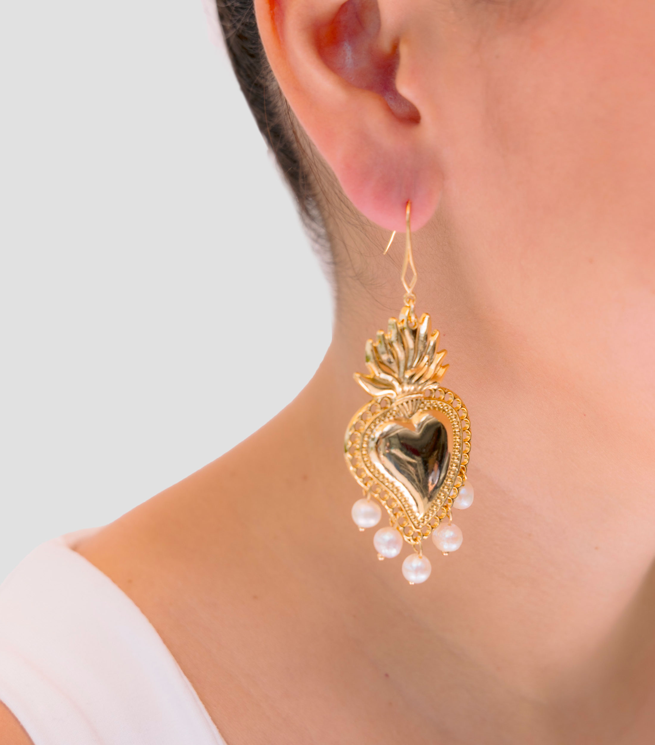 Aretes en forma de corazón Mujer
