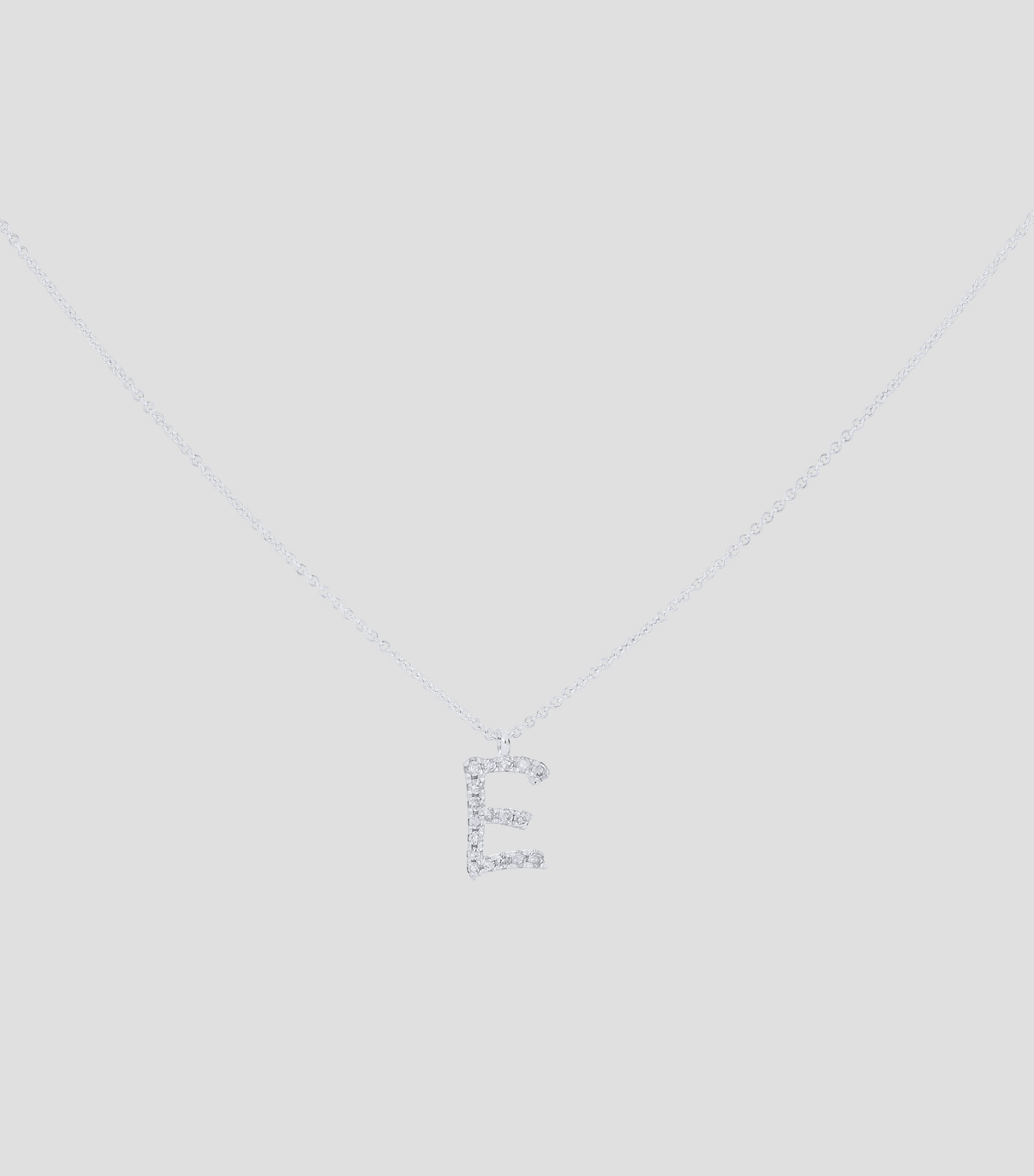 Dije en letra "E" y cadena en Oro blanco 14 Kts Mujer