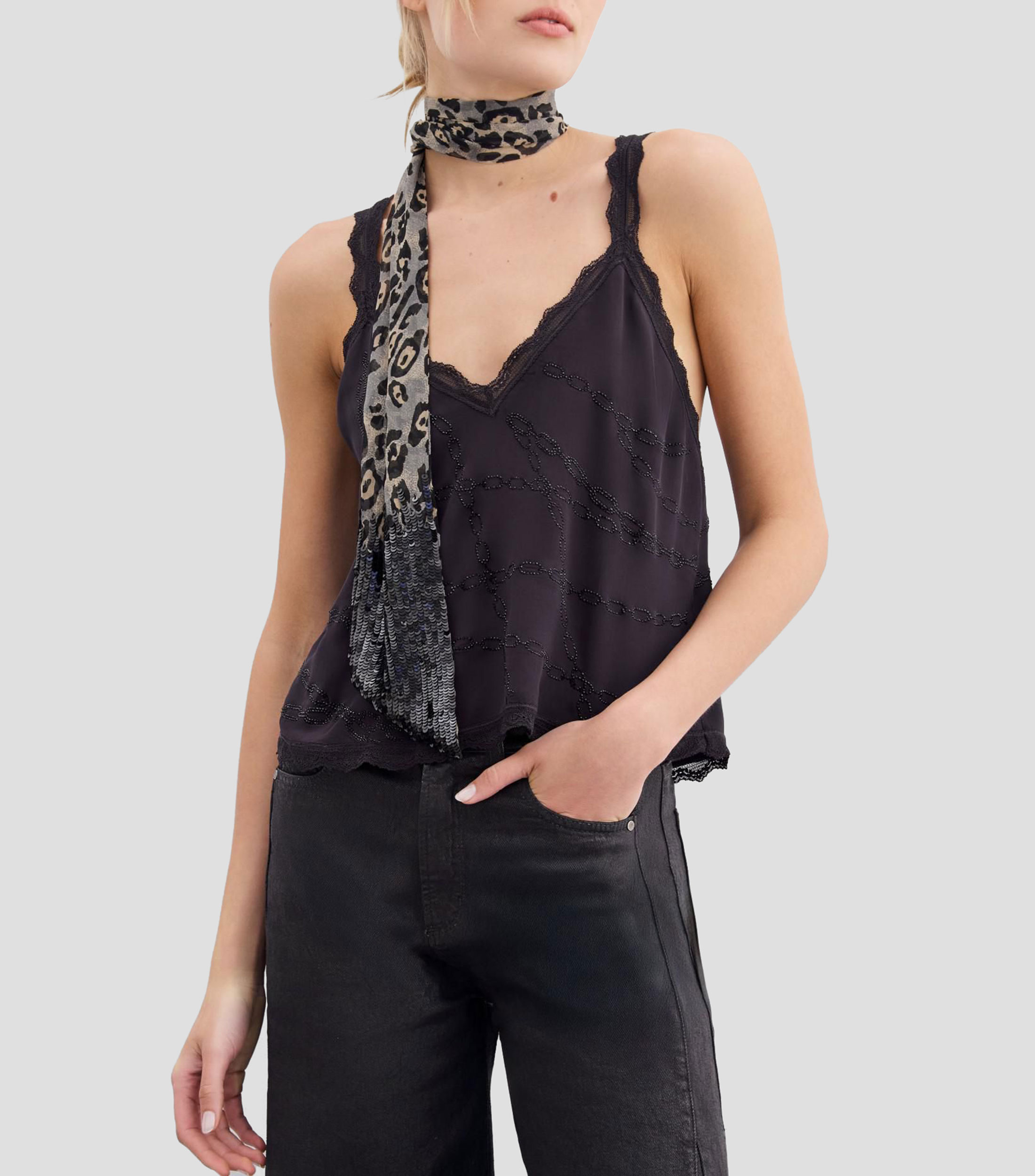 Blusa lisa sin mangas Mujer