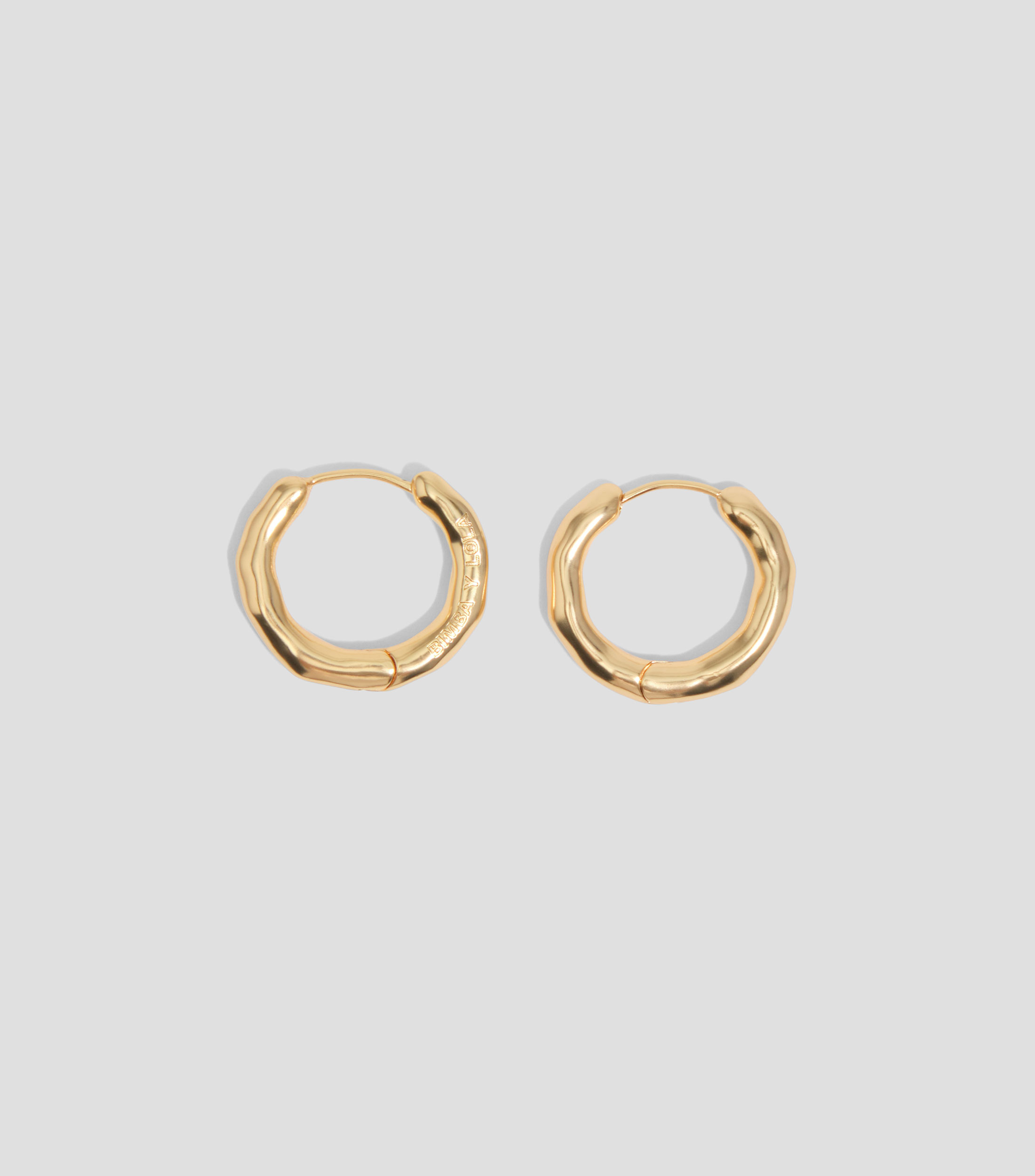 Pendientes aro irregular Mujer