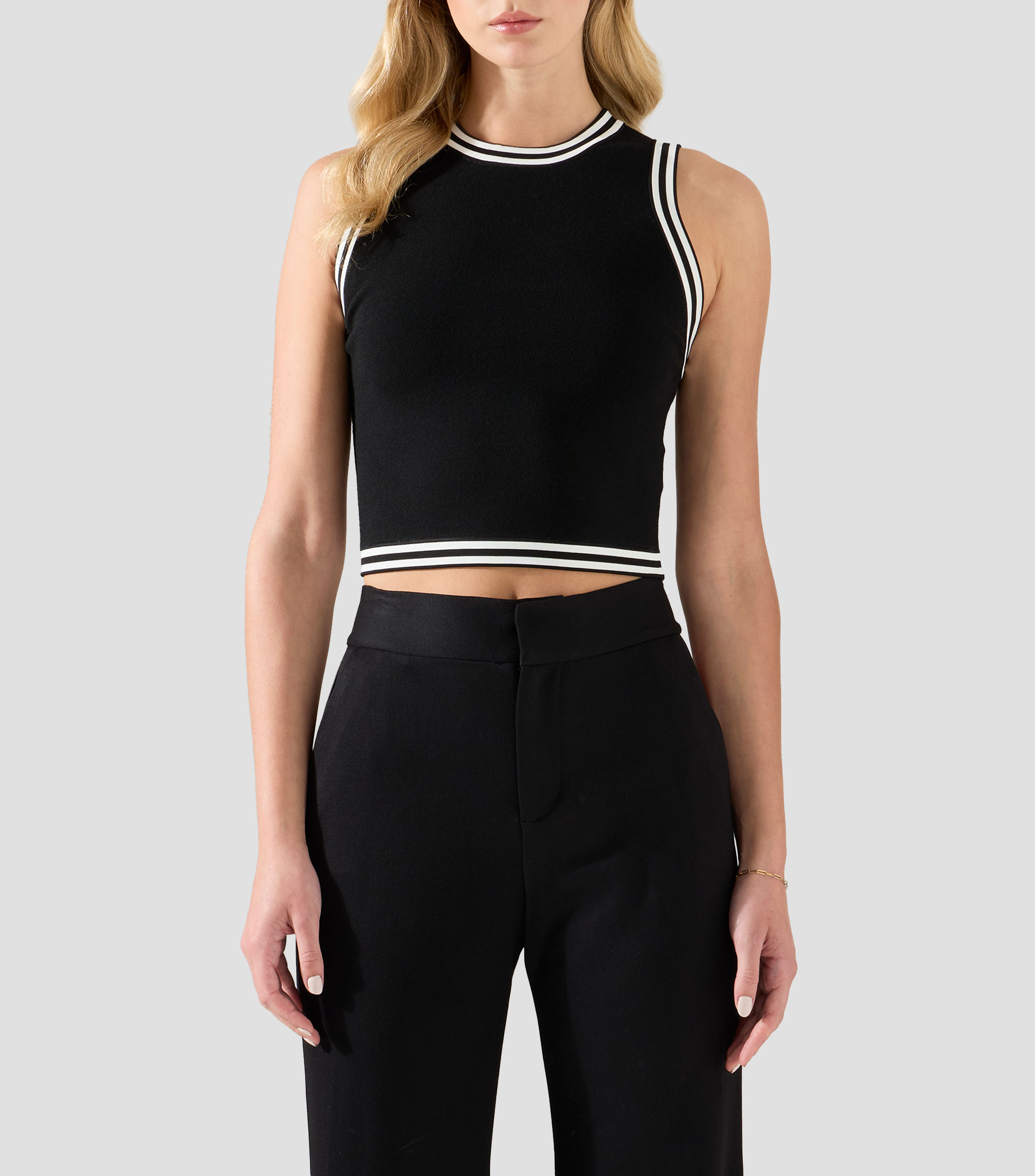 Blusa lisa sin mangas Mujer