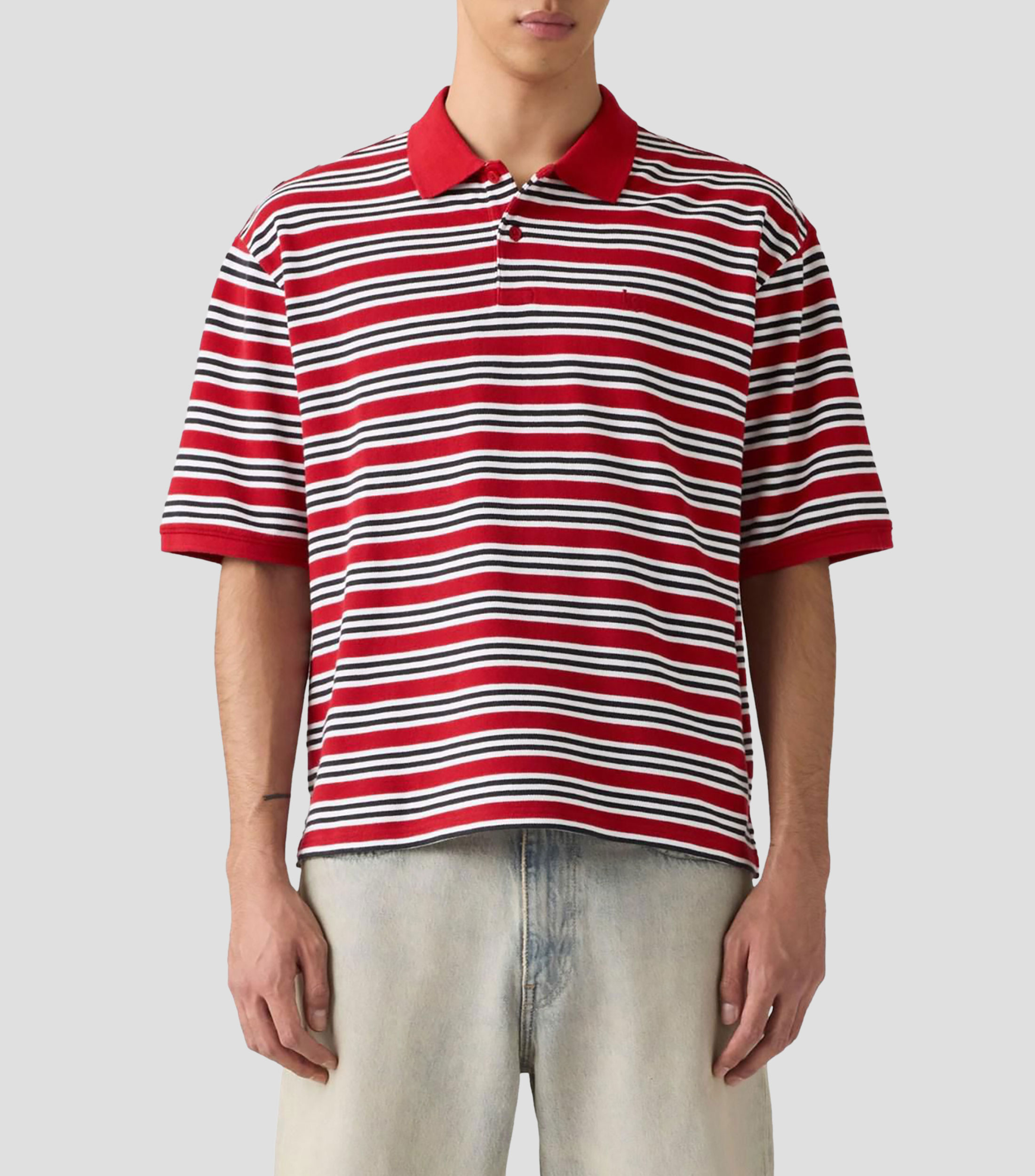 Playera tipo polo manga corta con líneas Hombre