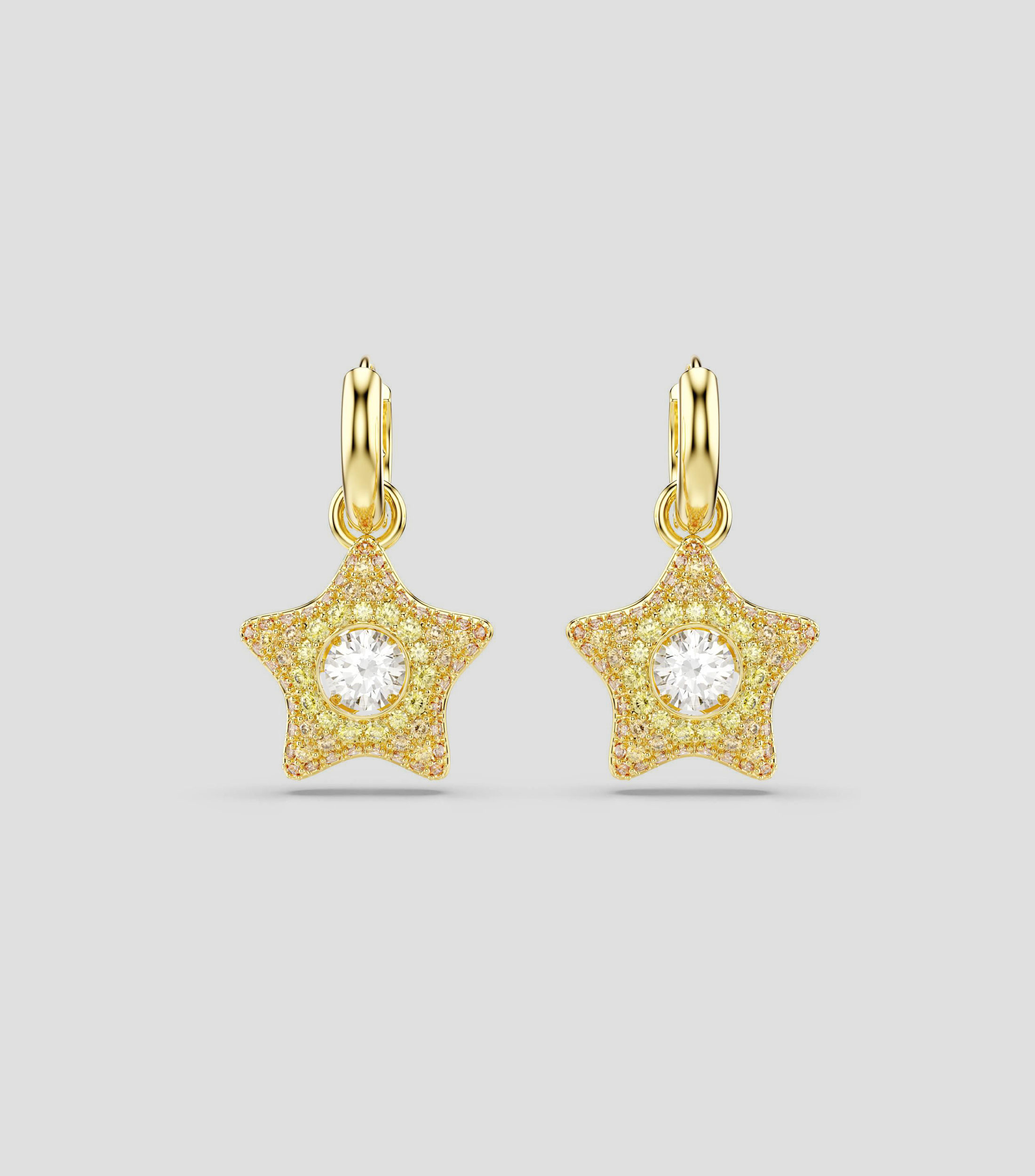 Aretes en forma de estrella con cristales Swarovski Zirconia y Dancing Stones amarillos Sublima Mujer