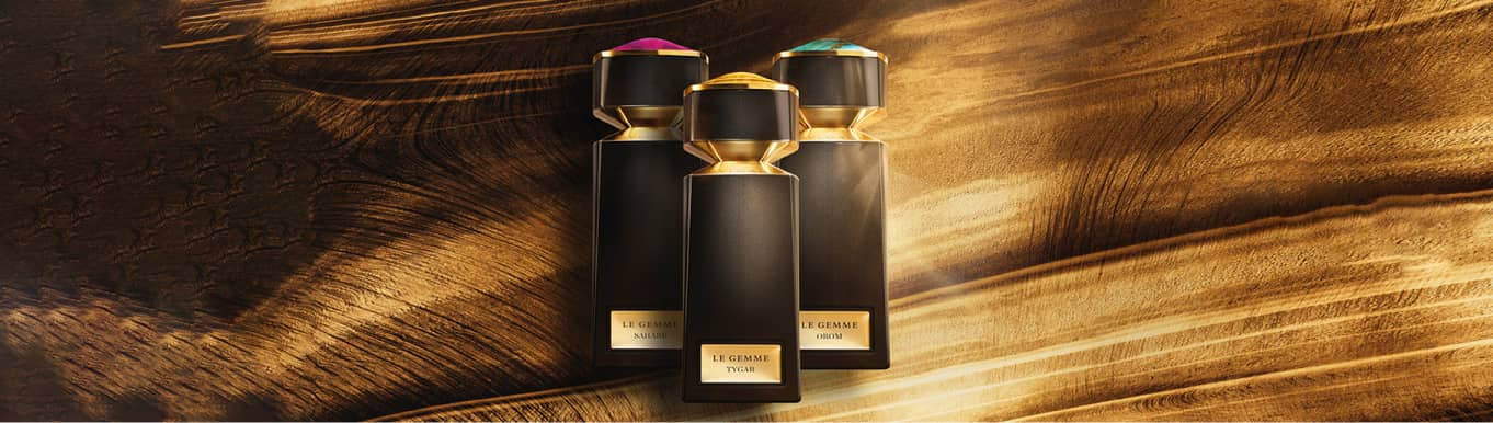 imagen de 3 perfumes de botella color negro, BVLGARI