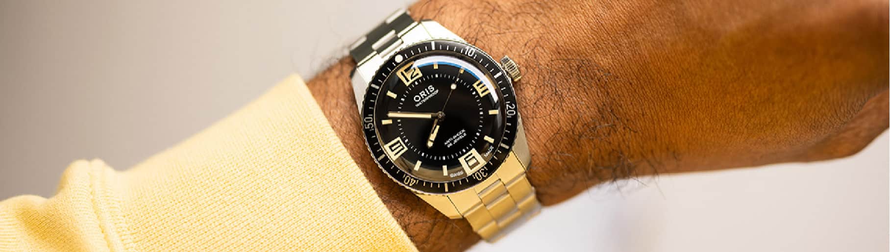 Imagen de un reloj de caratula negra, ORIS