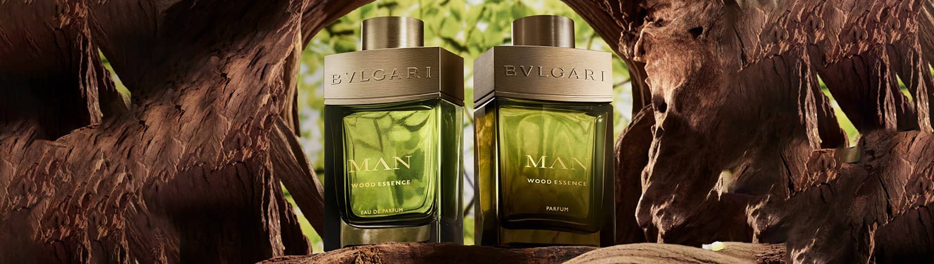 imagen de 2 perfumes de botella color verde con cobre de la marca BVLGARI