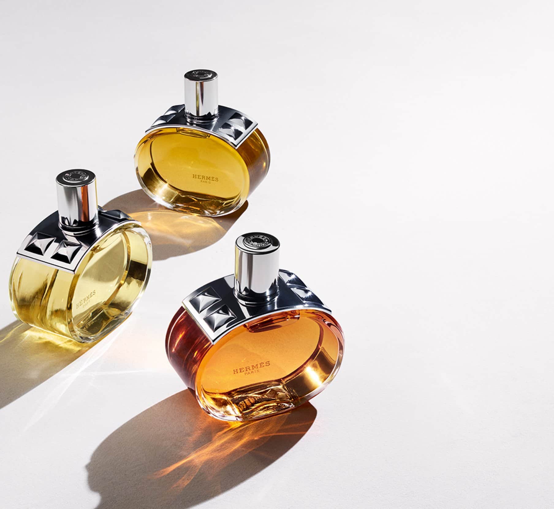 Imagen de dos lociones distintas de la marca, HERMES