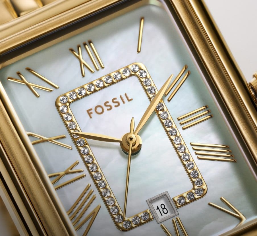 imagen de reloj dorado con blanco de la marca FOSSIL