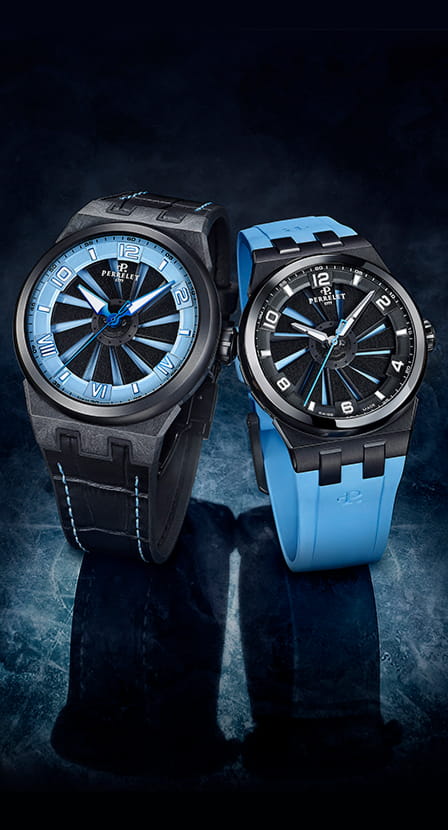 Imagen de dos relojes negros con azul. PERRELET
