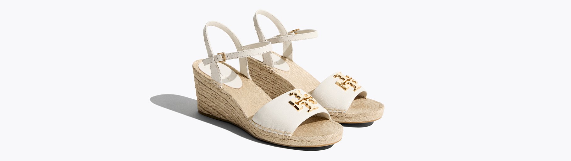imagen de sanalias blancas de la marca TORY BURCH