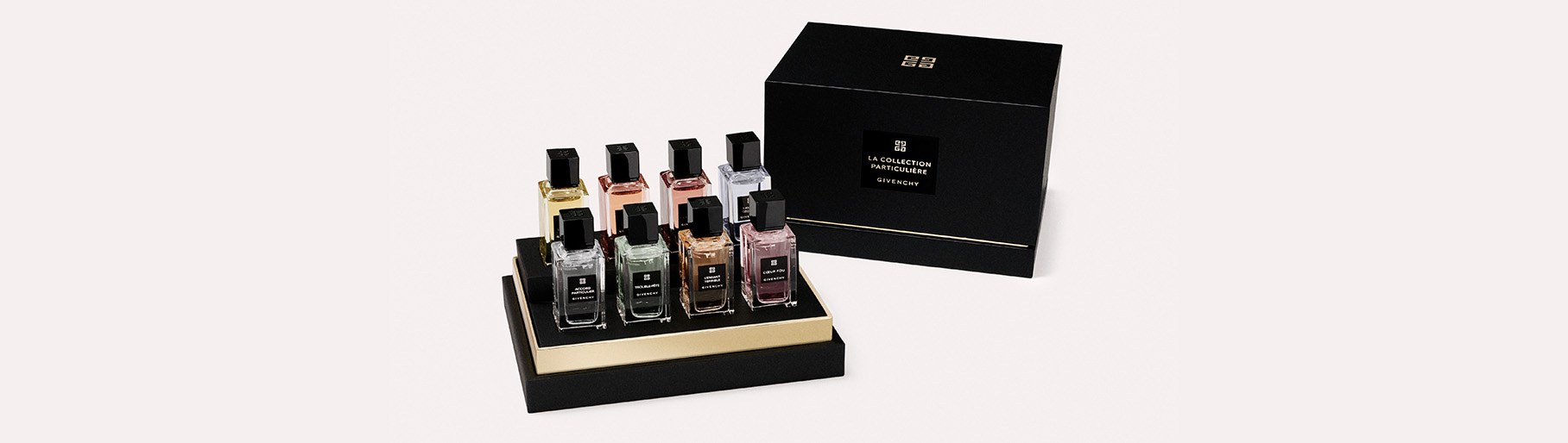 imagen de caja de lociones con 8 botellas de la marca GIVENCHY  