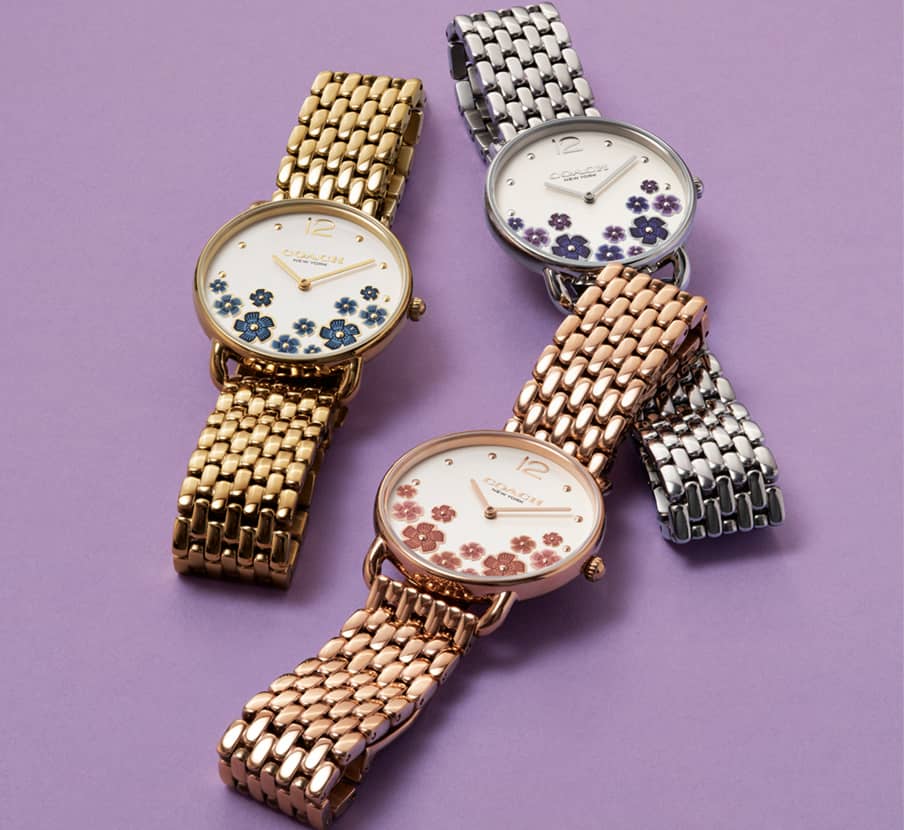 imagen de tres relojes de la marca COACH