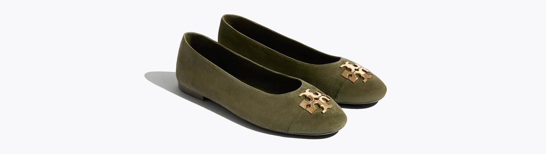 imagen de par de zapatos verdes de la marca TORY BURCH  