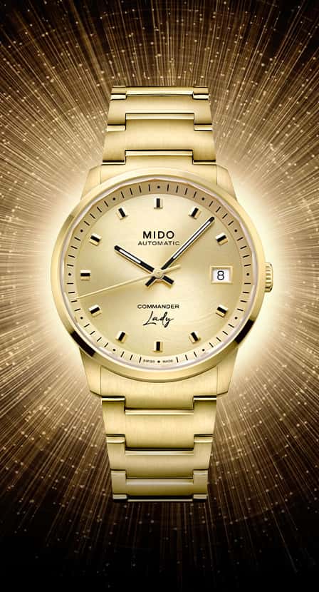 reloj dorado de la marca MIDO