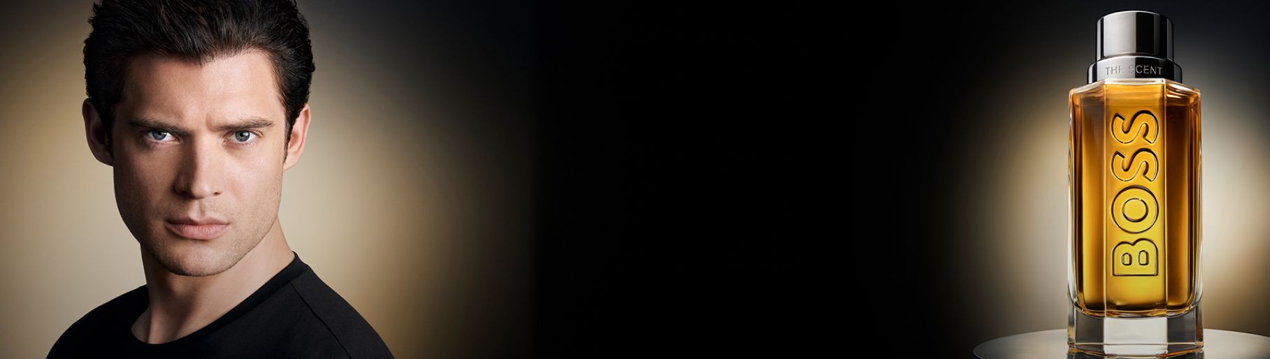 imagen de hombre junto a locion ambar de la marca HUGO BOSS