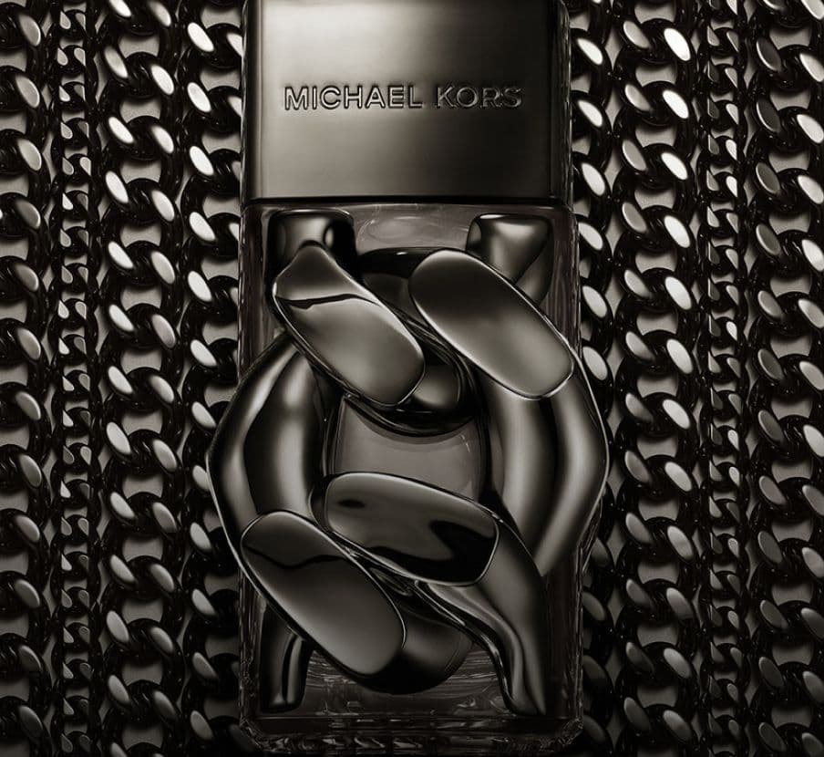 Imagen de una botellla de perfume color gris obscura MICHAEL KORS