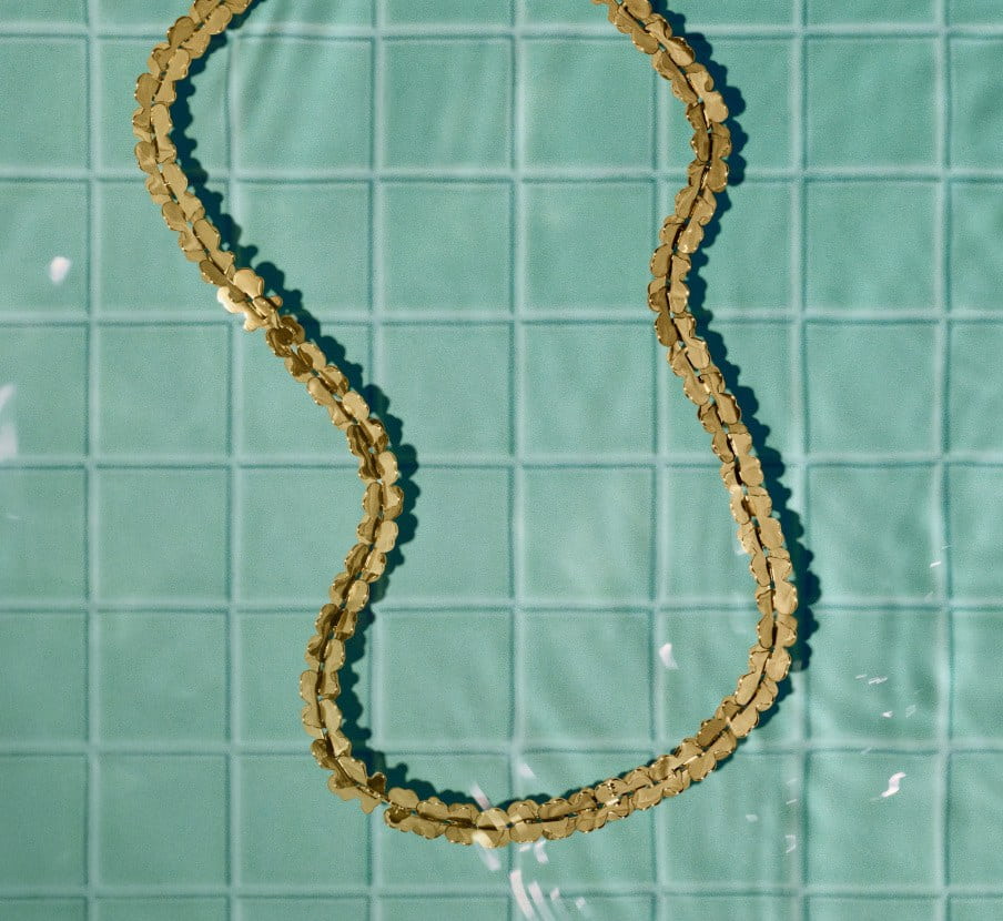 imagen de collar dorado de la marca TOUS