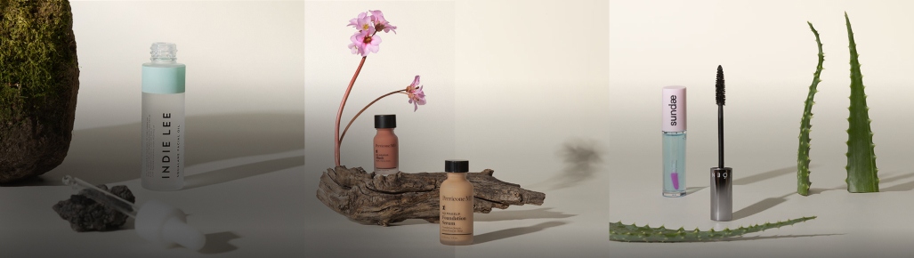 Imagen barios productos de trataminto junto a plantas de savila. Origen