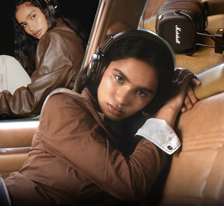 mujer dentro de un auto, viendo al espectador lleva unos audifonos color cafes de la marca MARSHALL. MARSHALL