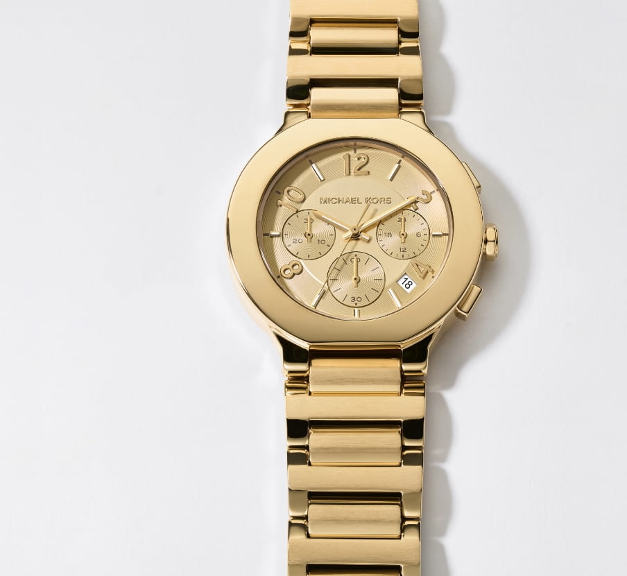 imagen de reloj color dorado para mujer. MICHAEL KORS