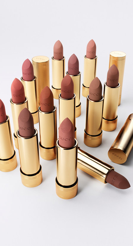 imagen de barios labiales con estuche dorado de colores cafes de la marca GUCCI BEAUTY